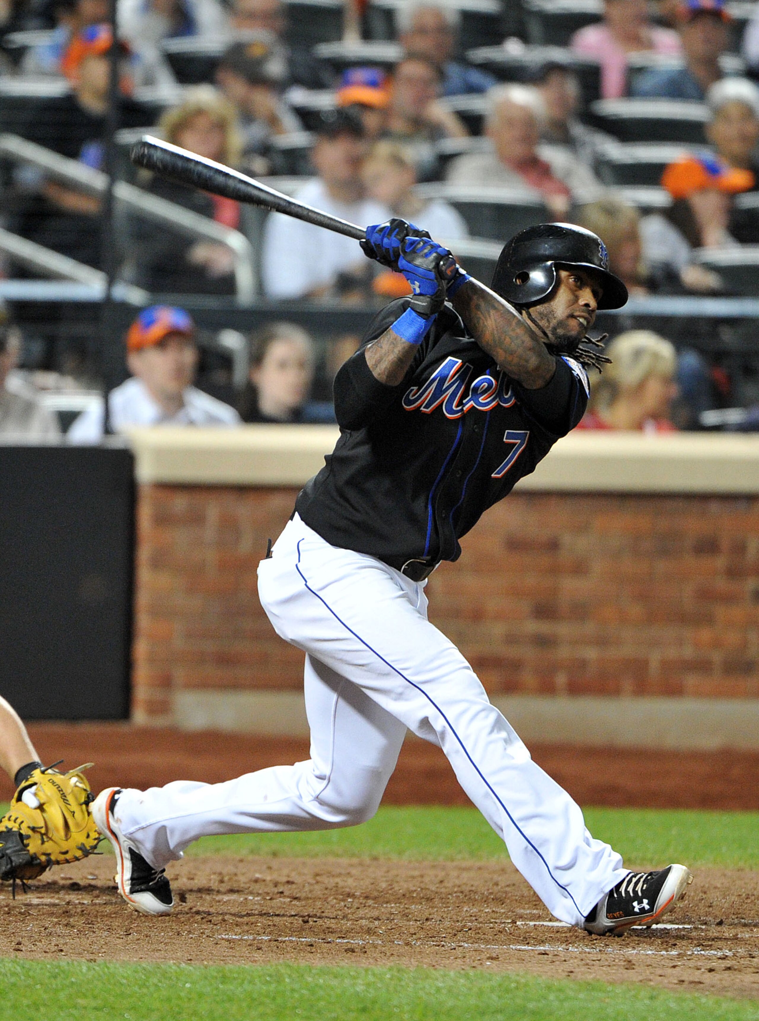 NEW YORK, NY - JUNE 04: Jose Reyes #7 of the New York Mets watches his three RBI triple in the bottom of the seventh inning against the Atlanta Braves at Citi Field on June 4, 2011 in the Flushing neighborhood of the Queens borough of New York City. (Phot