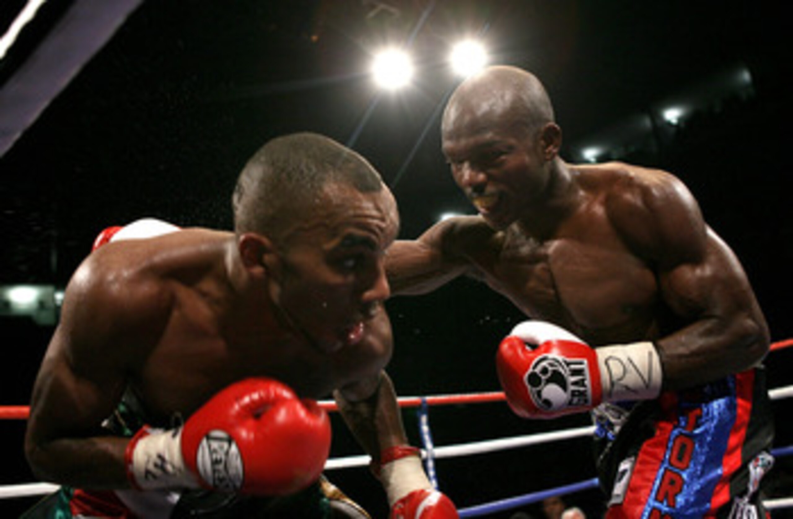 NOTTINGHAM, ENGLAND - MAY 10:  Timothy Bradley (R) catches Junior Witter during their WBC Light Welterweight fight on May 10, 2008 at Nottingham Ice Arena in Nottingham, England. (Photo by John Gichigi/Getty Images)