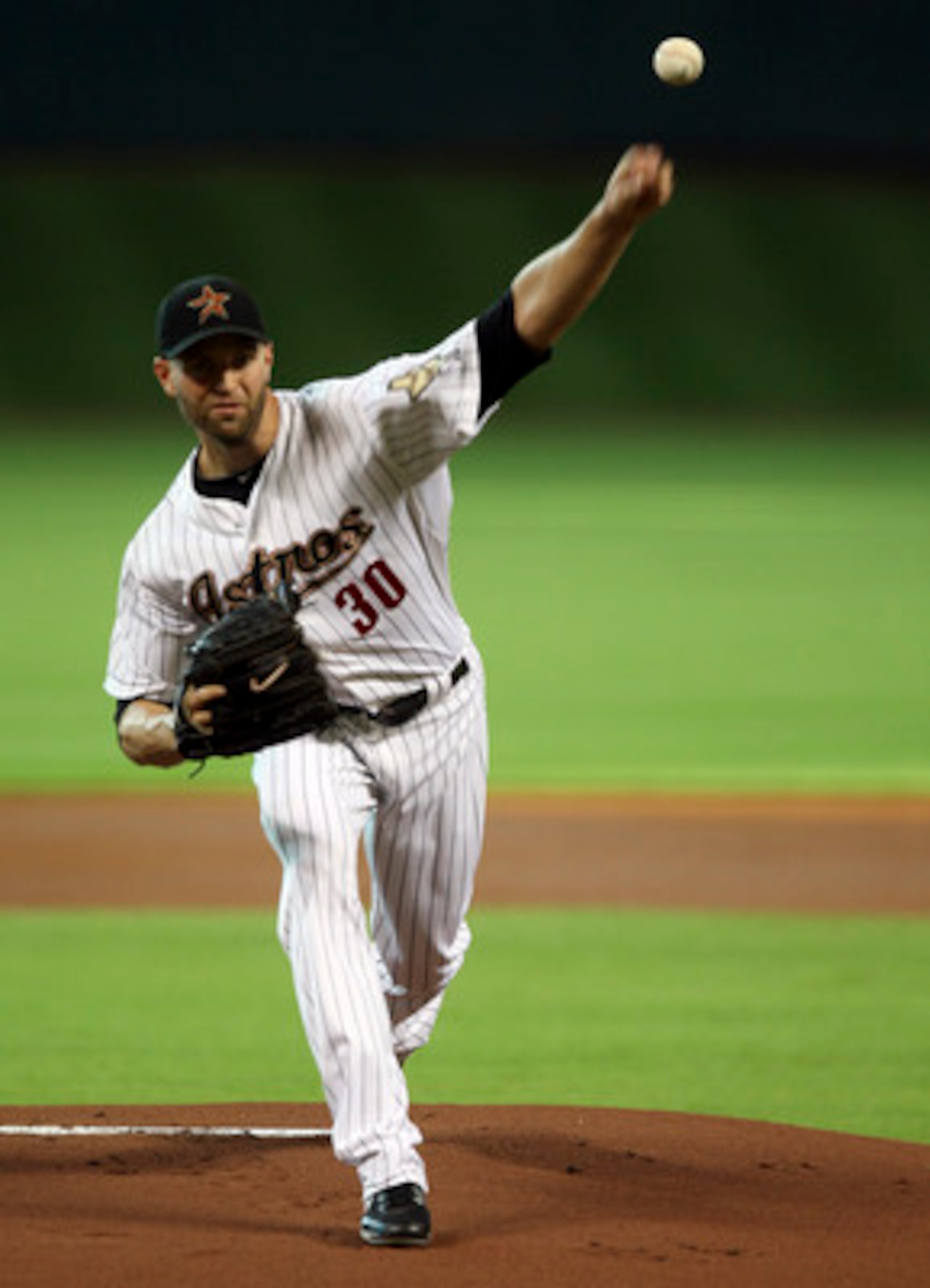 HOUSTON - JUNE 09:  Pitcher J.A. Happ #30 of the Houston Astros throws against the St. Louis Cardinals in the first inning at Minute Maid Park on June 9, 2011 in Houston, Texas.  (Photo by Bob Levey/Getty Images)
