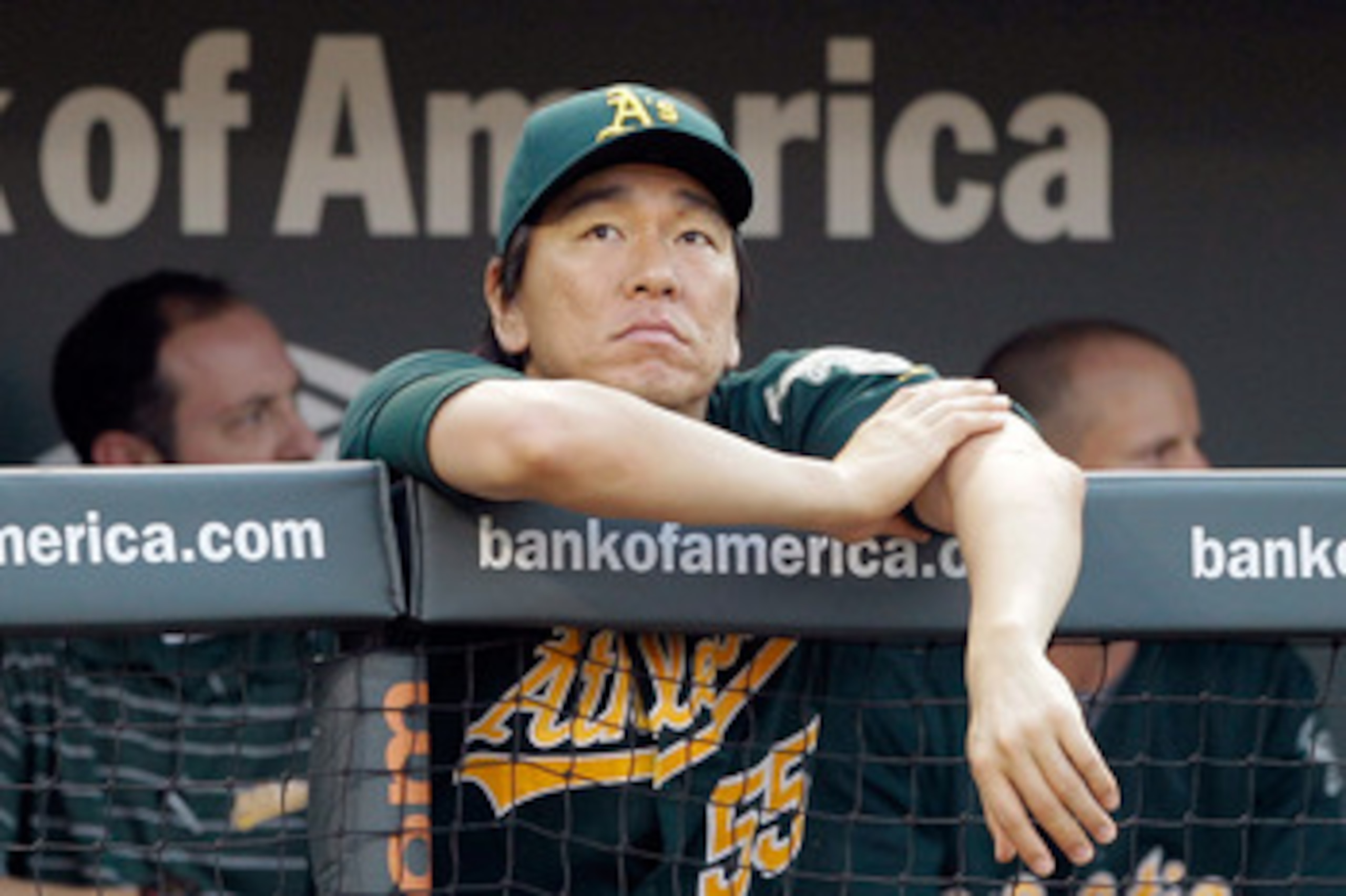 BALTIMORE, MD - JUNE 08: Hideki Matsui #55 of the Oakland Athletics looks on from the dugout during the second inning against the Baltimore Orioles  at Oriole Park at Camden Yards on June 8, 2011 in Baltimore, Maryland.  (Photo by Rob Carr/Getty Images)