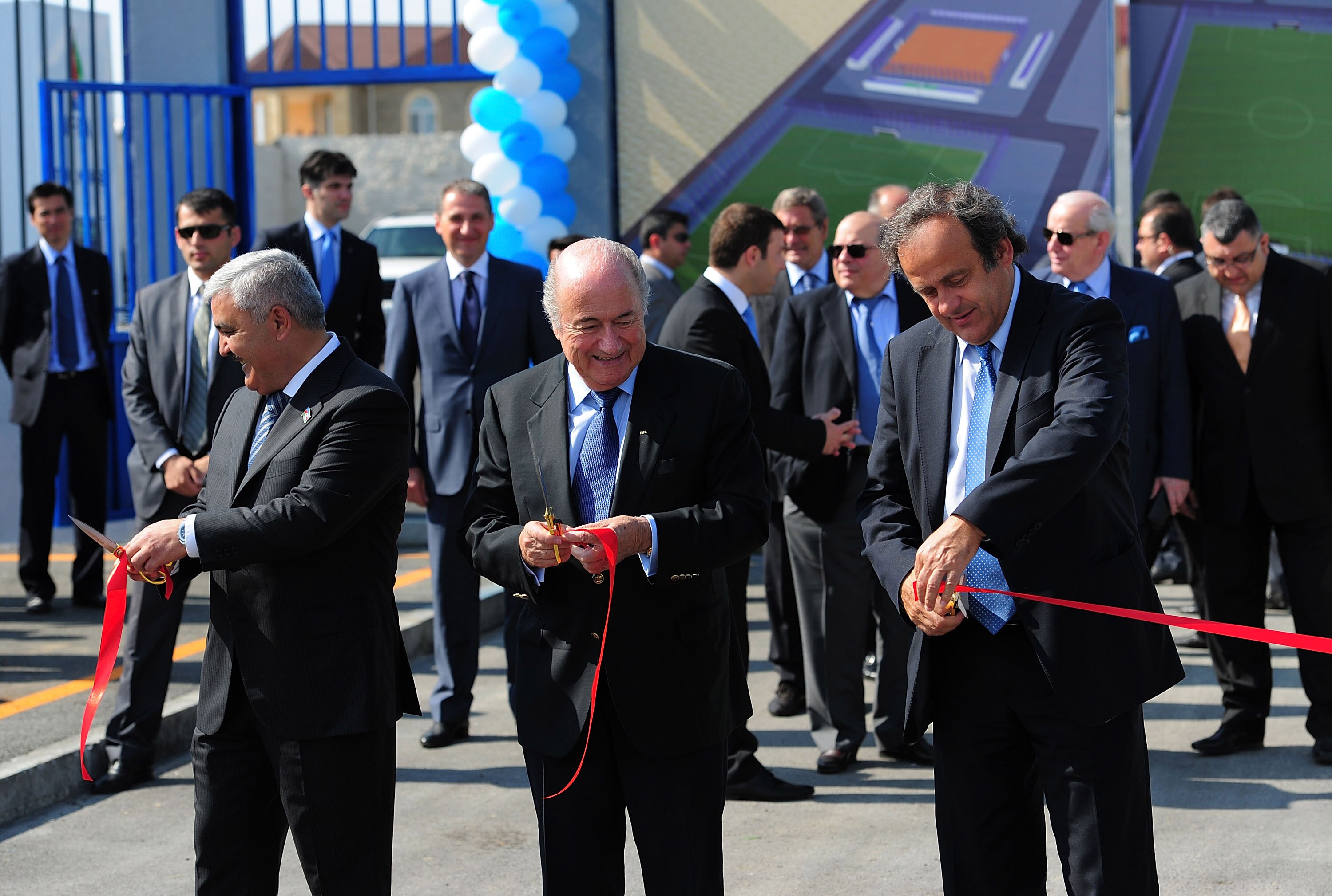 BAKU, AZERBAIJAN - JUNE 06:  FIFA president Sepp Blatter (c) and UEFA president Michel Platini (r) take part in the Opening Ceremony of Dalga stadium which will be a venue for the FIFA U17 WWC 2012 during a visit  to mark 100 years of Football Azerbaijan