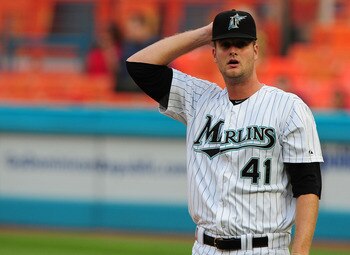 MIAMI GARDENS, FL - JUNE 09:  Pitcher Chris Volstad #41 0f the Florida Marlins Reacts after giving up a double to the Atlanta Braves at Sun Life Stadium on June 9, 2011 in Miami Gardens, Florida.  (Photo by Marc Serota/Getty Images)