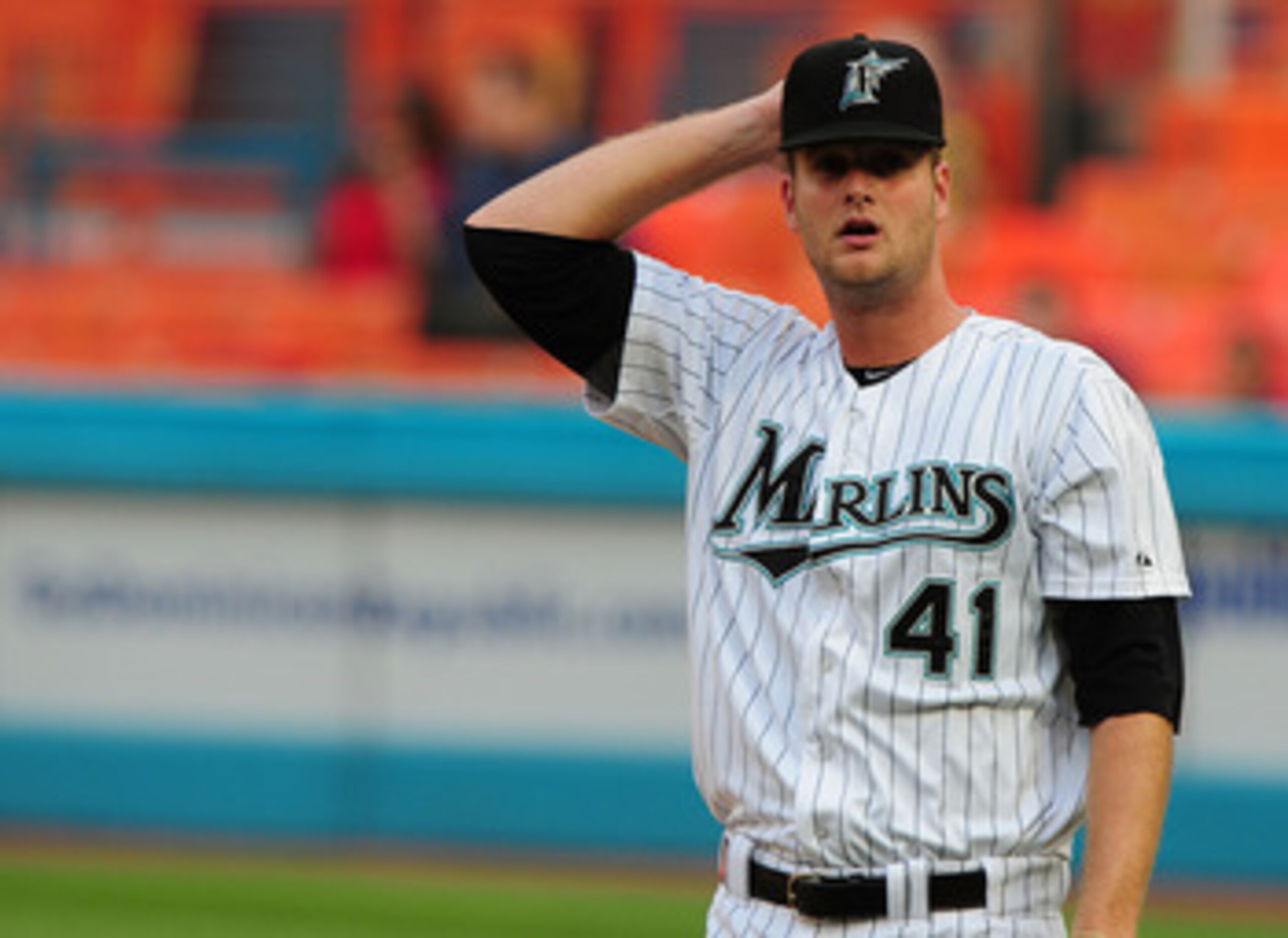 MIAMI GARDENS, FL - JUNE 09:  Pitcher Chris Volstad #41 0f the Florida Marlins Reacts after giving up a double to the Atlanta Braves at Sun Life Stadium on June 9, 2011 in Miami Gardens, Florida.  (Photo by Marc Serota/Getty Images)