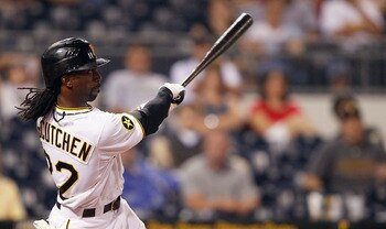 PITTSBURGH - JUNE 08:  Andrew McCutchen #22 of the Pittsburgh Pirates hits a walk off solo home run in the 12th inning against the Arizona Diamondbacks during the game on June 8, 2011 at PNC Park in Pittsburgh, Pennsylvania.  (Photo by Jared Wickerham/Get