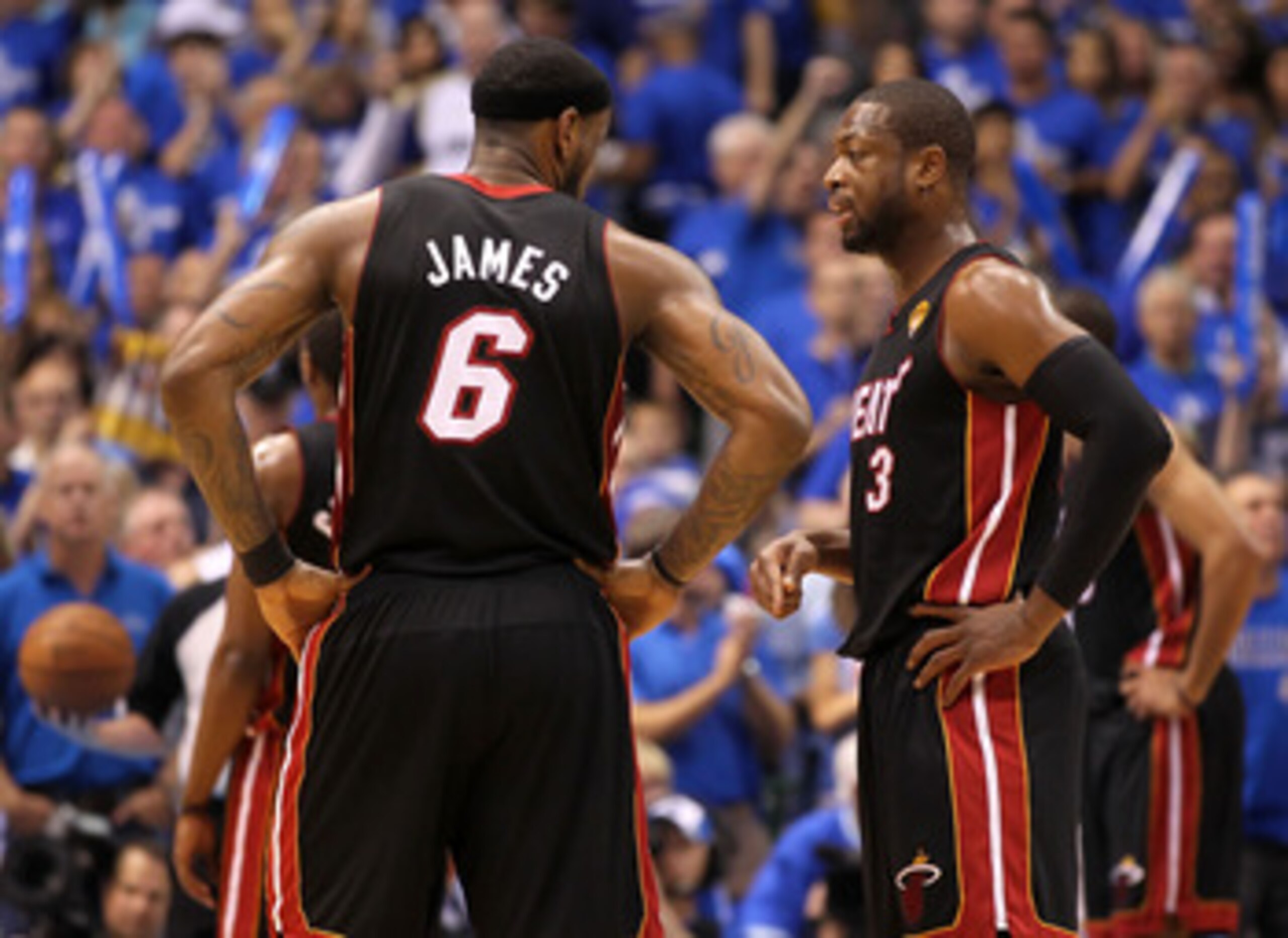 DALLAS, TX - JUNE 09: LeBron James #6 and Dwyane Wade #3 of the Miami Heat talk on court against the Dallas Mavericks in Game Five of the 2011 NBA Finals at American Airlines Center on June 9, 2011 in Dallas, Texas. NOTE TO USER: User expressly acknowle DALLAS, TX - JUNE 09: LeBron James #6 and Dwyane Wade #3 of the Miami Heat talk on court against the Dallas Mavericks in Game Five of the 2011 NBA Finals at American Airlines Center on June 9, 2011 in Dallas, Texas. NOTE TO USER: User expressly acknowle