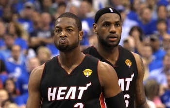DALLAS, TX - JUNE 09:  Dwyane Wade #3 and LeBron James #6 of the Miami Heat look on in the fourth quarter against the Dallas Mavericks in Game Five of the 2011 NBA Finals at American Airlines Center on June 9, 2011 in Dallas, Texas.  NOTE TO USER: User ex