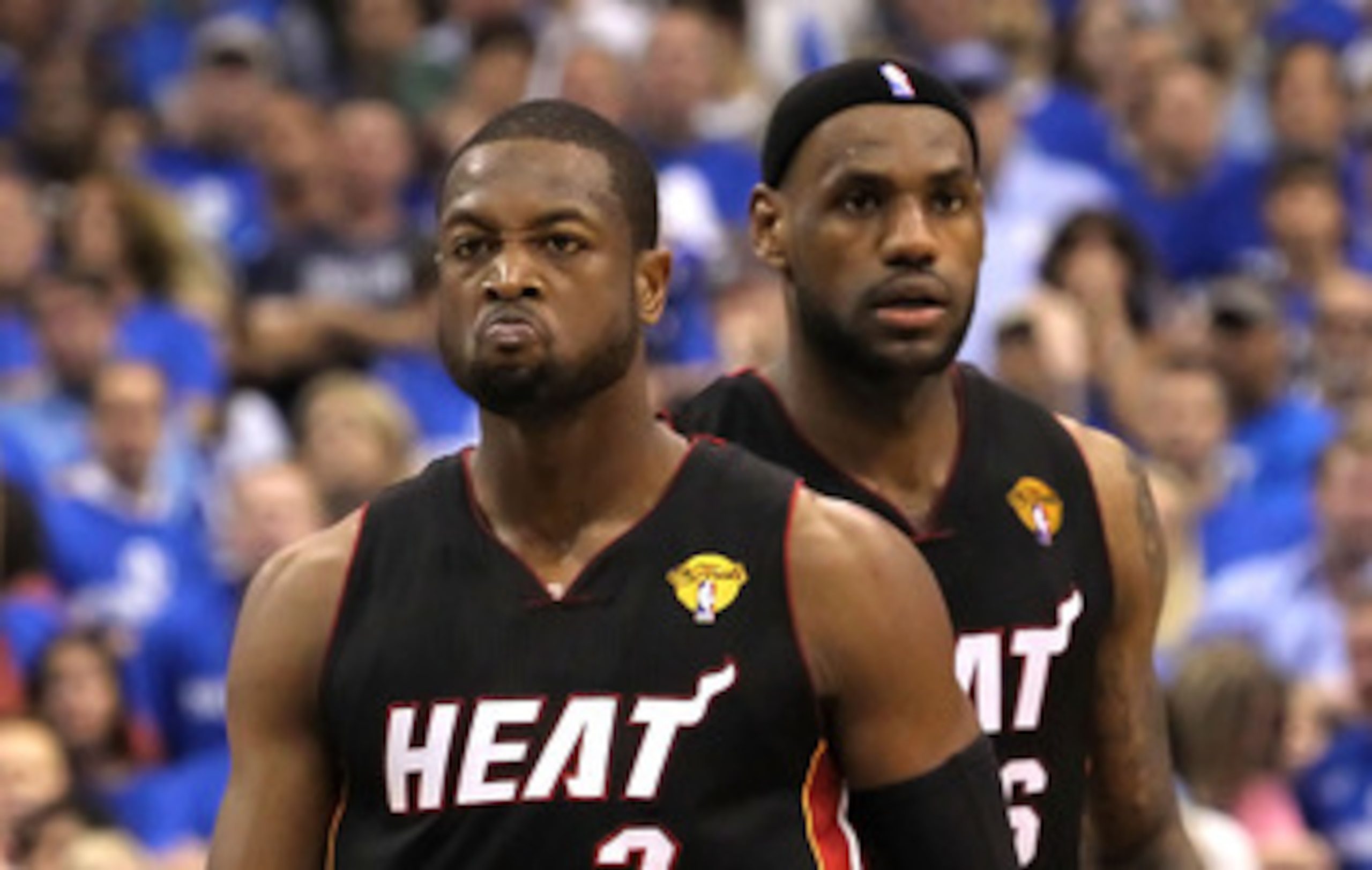 DALLAS, TX - JUNE 09:  Dwyane Wade #3 and LeBron James #6 of the Miami Heat look on in the fourth quarter against the Dallas Mavericks in Game Five of the 2011 NBA Finals at American Airlines Center on June 9, 2011 in Dallas, Texas.  NOTE TO USER: User ex