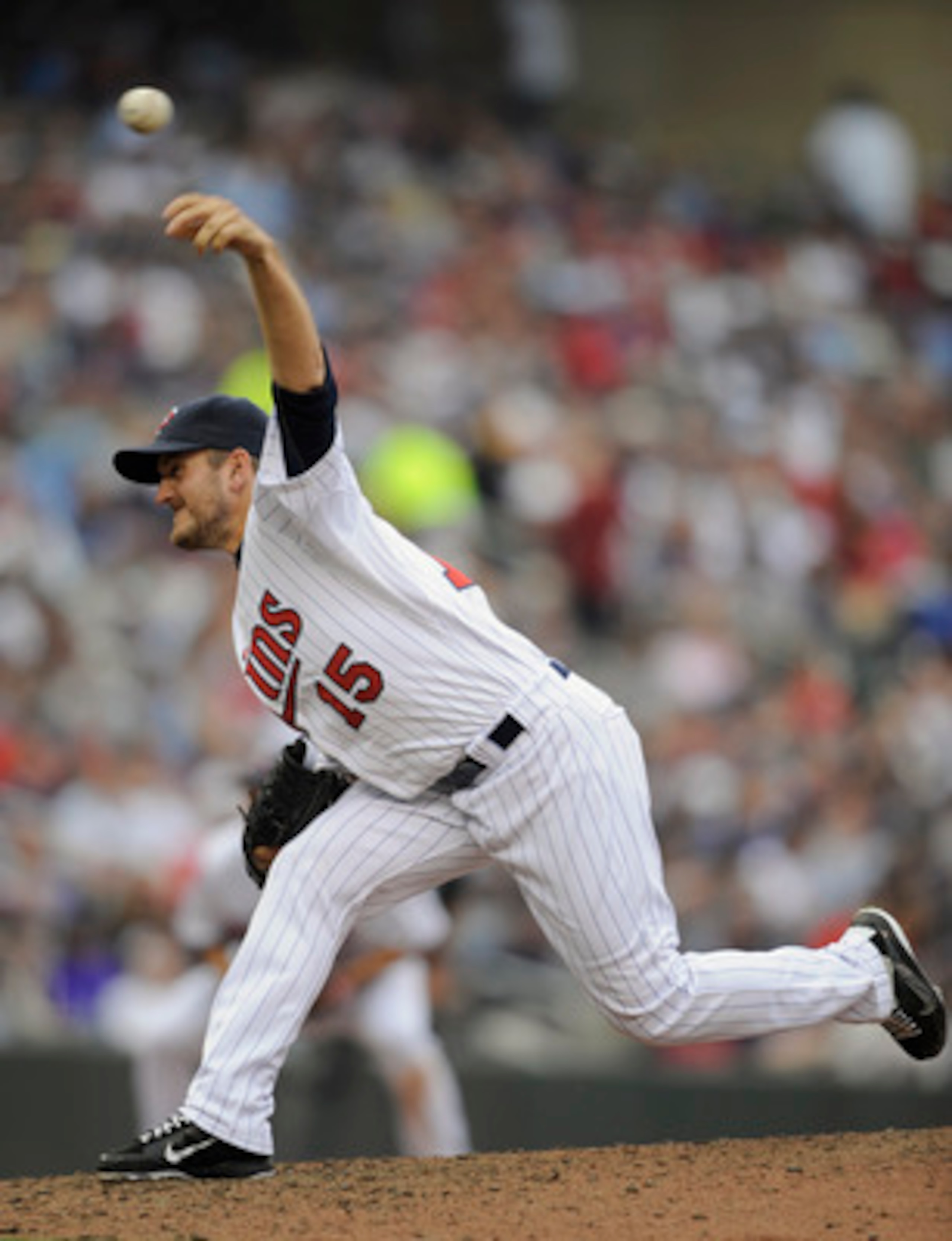 MINNEAPOLIS, MN - APRIL 10: Glen Perkins #15 of the Minnesota Twins pitches against the Oakland Athletics during the sixth inning of their game on April 10, 2011 at Target Field in Minneapolis, Minnesota. Athletics defeated the Twins 5-3. (Photo by Hannah
