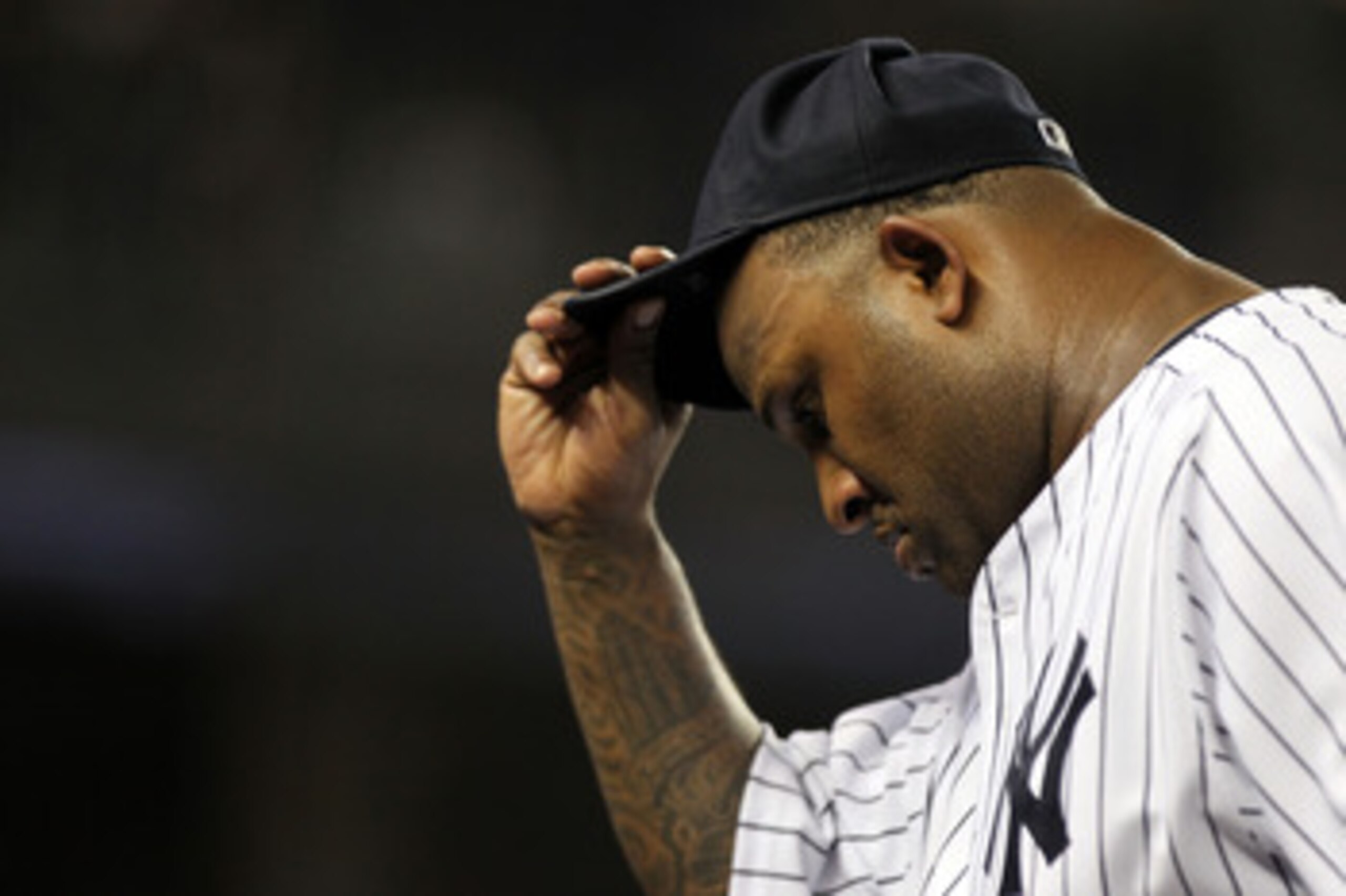 NEW YORK, NY - JUNE 09:  CC Sabathia #52 of the New York Yankees is pulled from the game in the seventh inning against the Boston Red Sox on June 9, 2011 at Yankee Stadium in the Bronx borough of New York City.  (Photo by Nick Laham/Getty Images)