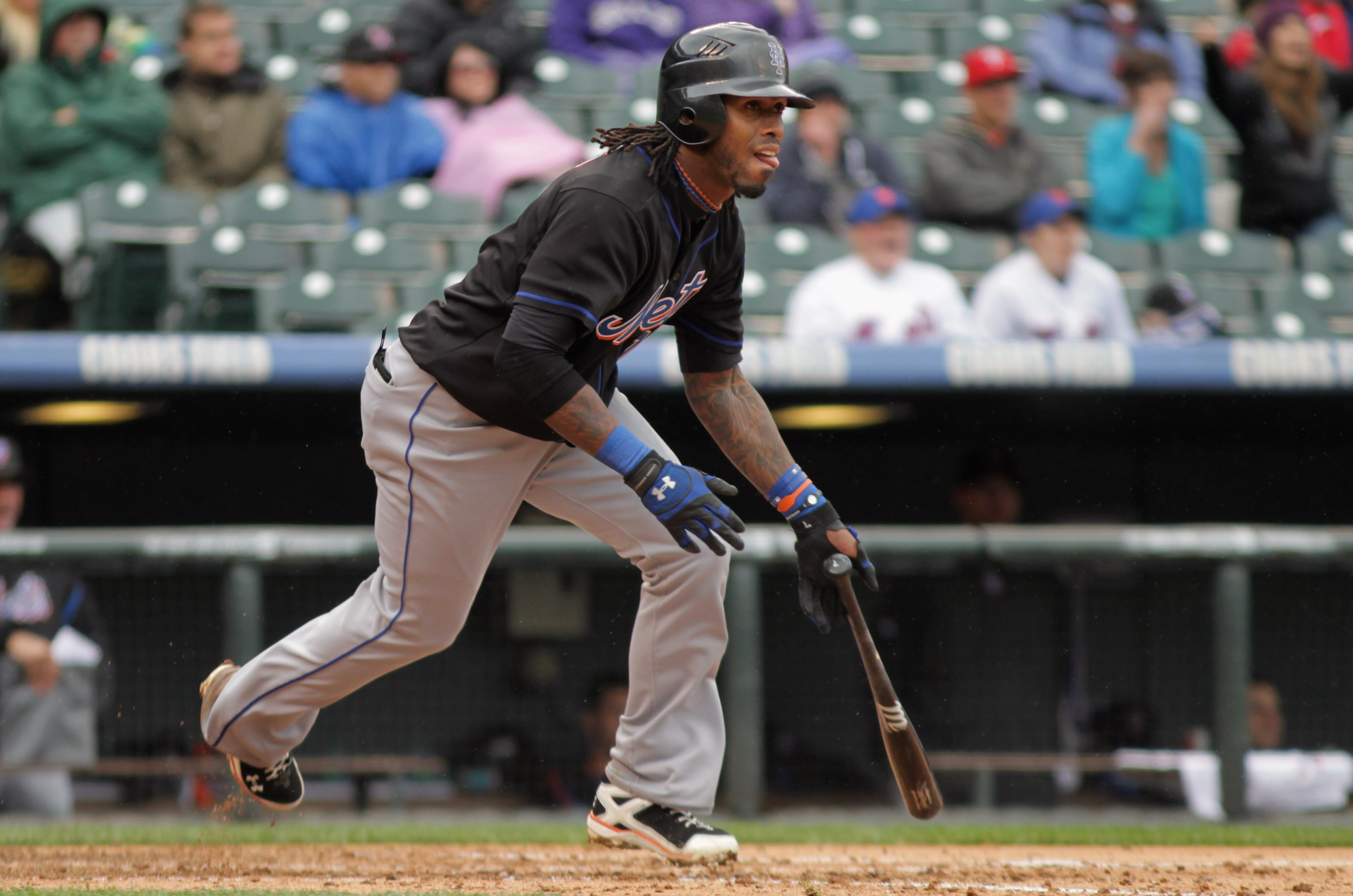 DENVER, CO - MAY 12:  Jose Reyes #7 of the New York Mets follows through on his two RBI single against the Colorado Rockies at Coors Field on May 12, 2011 in Denver, Colorado. The hit gave the Mets a 5-1 lead over the Rockies in the fourth inning.  (Photo