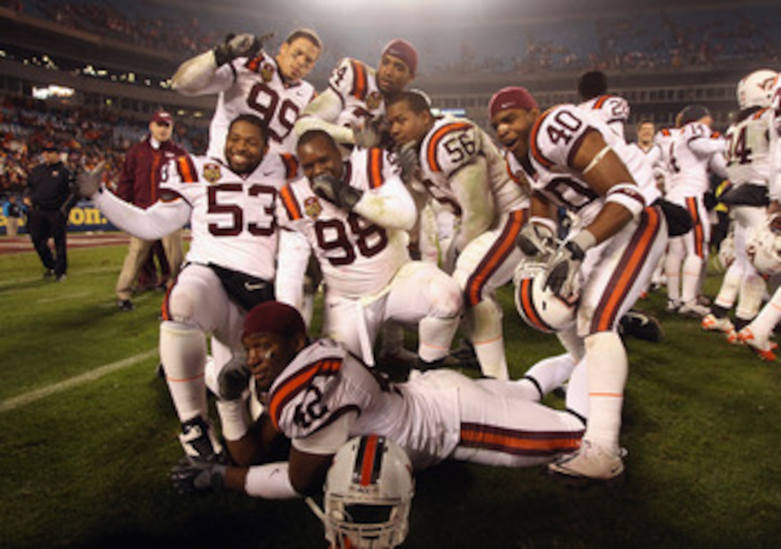 CHARLOTTE, NC - DECEMBER 04: The Virginia Tech Hokies celebrate after defeating the Florida State Seminoles to win the ACC Championship 44-33 at Bank of America Stadium on December 4, 2010 in Charlotte, North Carolina. (Photo by Streeter Lecka/Getty Ima CHARLOTTE, NC - DECEMBER 04: The Virginia Tech Hokies celebrate after defeating the Florida State Seminoles to win the ACC Championship 44-33 at Bank of America Stadium on December 4, 2010 in Charlotte, North Carolina. (Photo by Streeter Lecka/Getty Ima