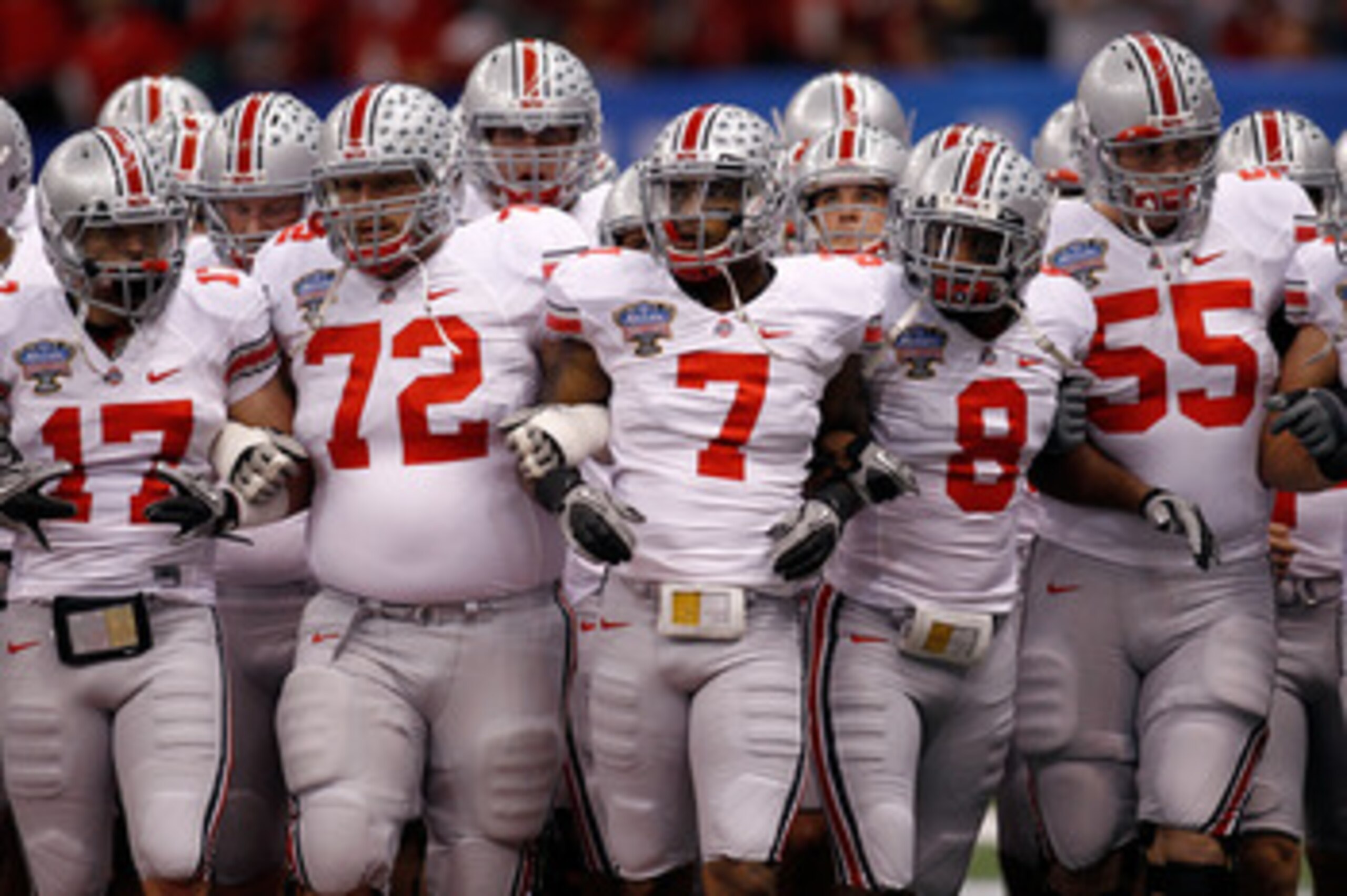 NEW ORLEANS, LA - JANUARY 04: Members of the Ohio State Buckeyes lock arms before the Allstate Sugar Bowl against the Arkansas Razorbacks at the Louisiana Superdome on January 4, 2011 in New Orleans, Louisiana. (Photo by Chris Graythen/Getty Images) NEW ORLEANS, LA - JANUARY 04: Members of the Ohio State Buckeyes lock arms before the Allstate Sugar Bowl against the Arkansas Razorbacks at the Louisiana Superdome on January 4, 2011 in New Orleans, Louisiana. (Photo by Chris Graythen/Getty Images)