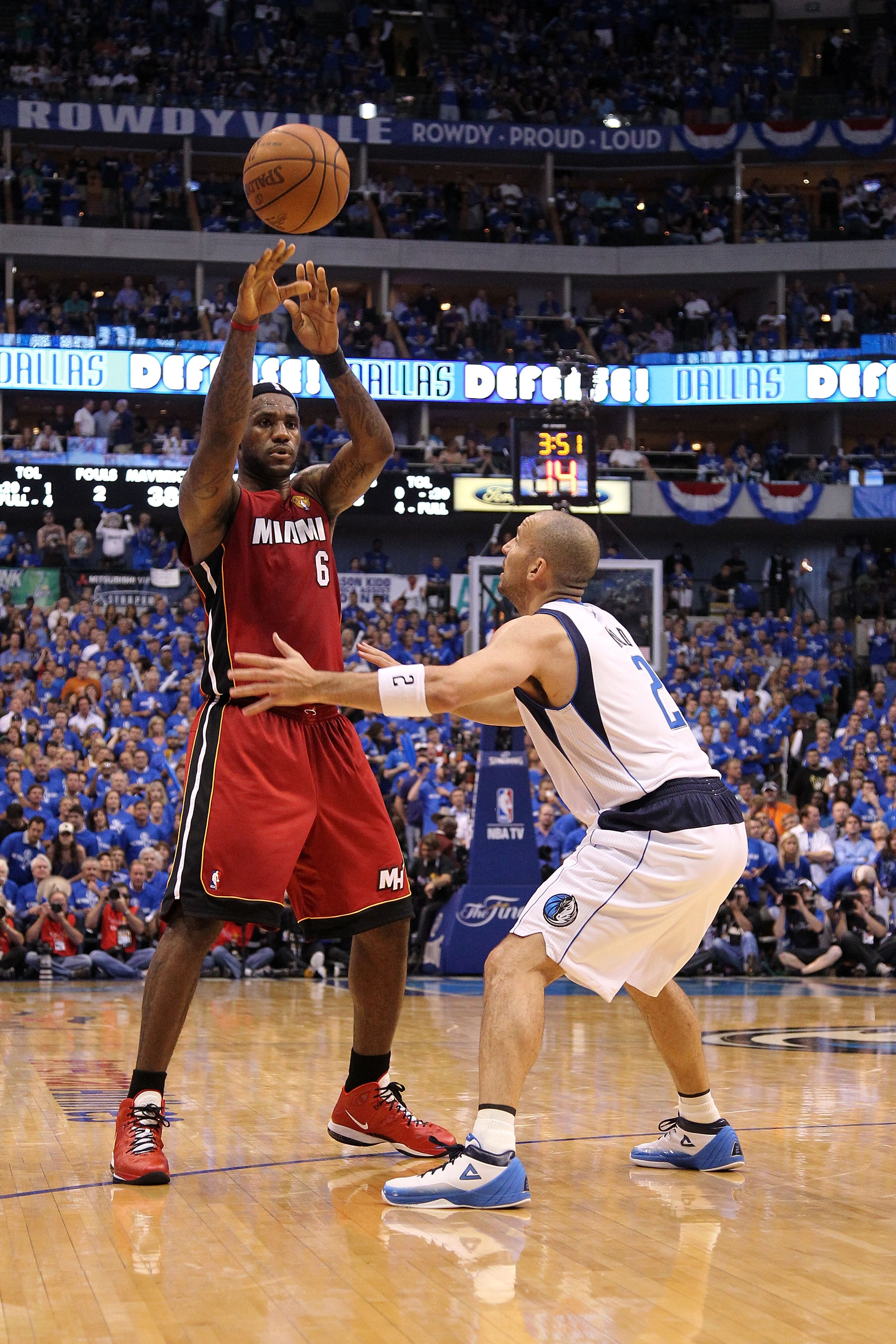 DALLAS, TX - JUNE 07: LeBron James #6 of the Miami Heat passes against Jason Kidd #2 of the Dallas Mavericks  in Game Four of the 2011 NBA Finals at American Airlines Center on June 7, 2011 in Dallas, Texas. The Mavericks won 86-83. NOTE TO USER: User exp
