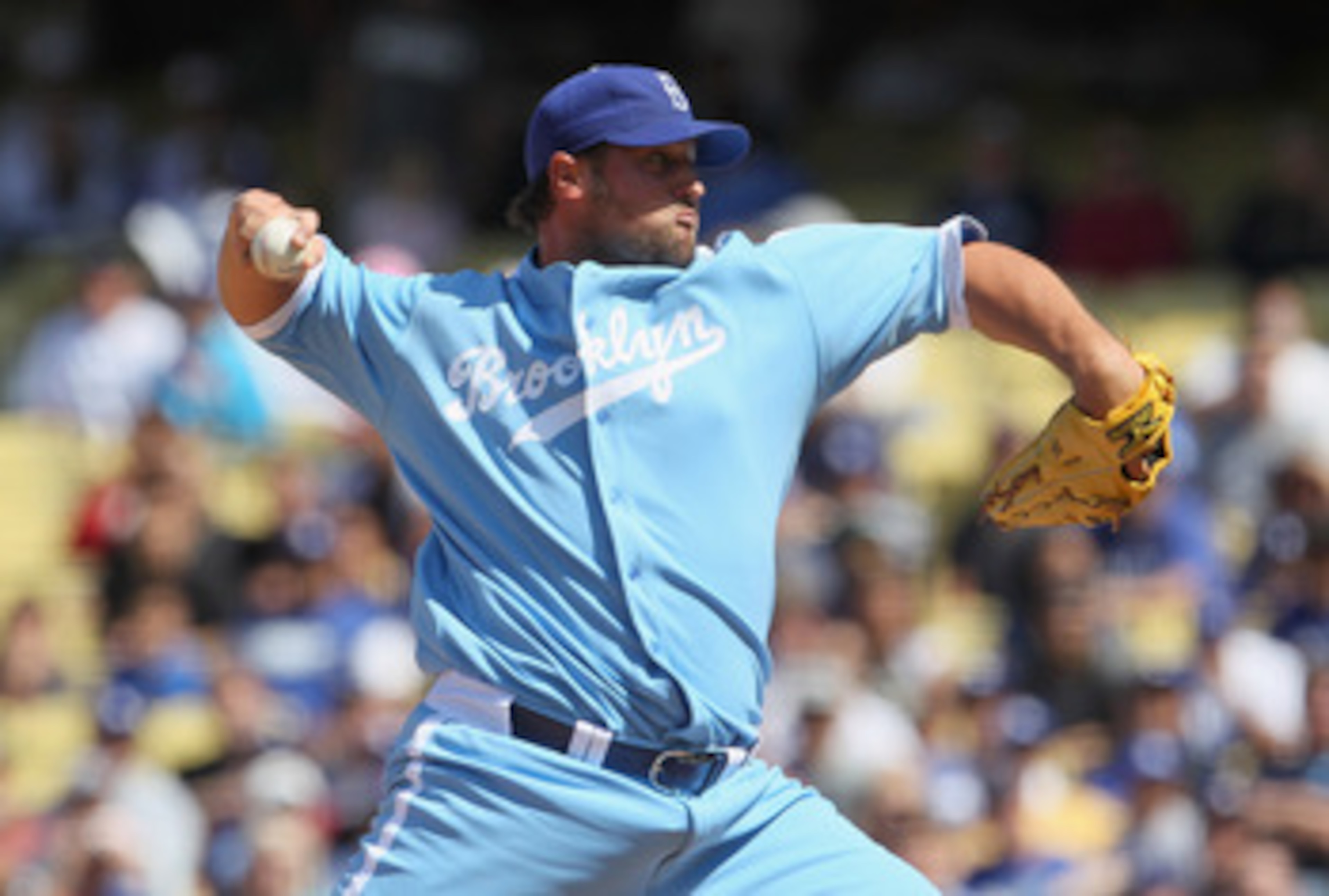 LOS ANGELES, CA - APRIL 21:  Jonathan Broxton #51 of the Los Angeles Dodgers pitches against the Atlanta Braves at Dodger Stadium on April 21, 2011 in Los Angeles, California.  (Photo by Jeff Gross/Getty Images)