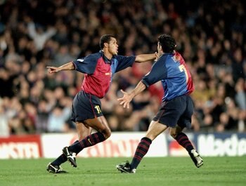 1 Mar 2000:  Rivaldo of Barcelona celebrates a goal against Porto with team mate Luis Figo during the UEFA Champions League group A match at the Nou Camp in Barcelona, Spain. Barcelona won 4-2. \ Mandatory Credit: Shaun Botterill /Allsport