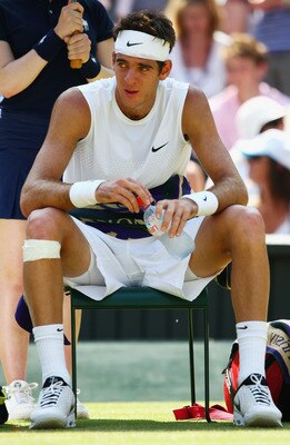 WIMBLEDON, ENGLAND - JUNE 25:  Juan Martin Del Potro of Argentina looks despondent during the men's singles second round match against Lleyton Hewitt of Australia on Day Four of the Wimbledon Lawn Tennis Championships at the All England Lawn Tennis and Cr