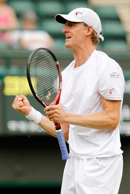 LONDON, ENGLAND - JUNE 21:  Kevin Andersen of South Africa in action during his first round match against Nikolay Davydenko of Russia on Day One of the Wimbledon Lawn Tennis Championships at the All England Lawn Tennis and Croquet Club on June 21, 2010 in