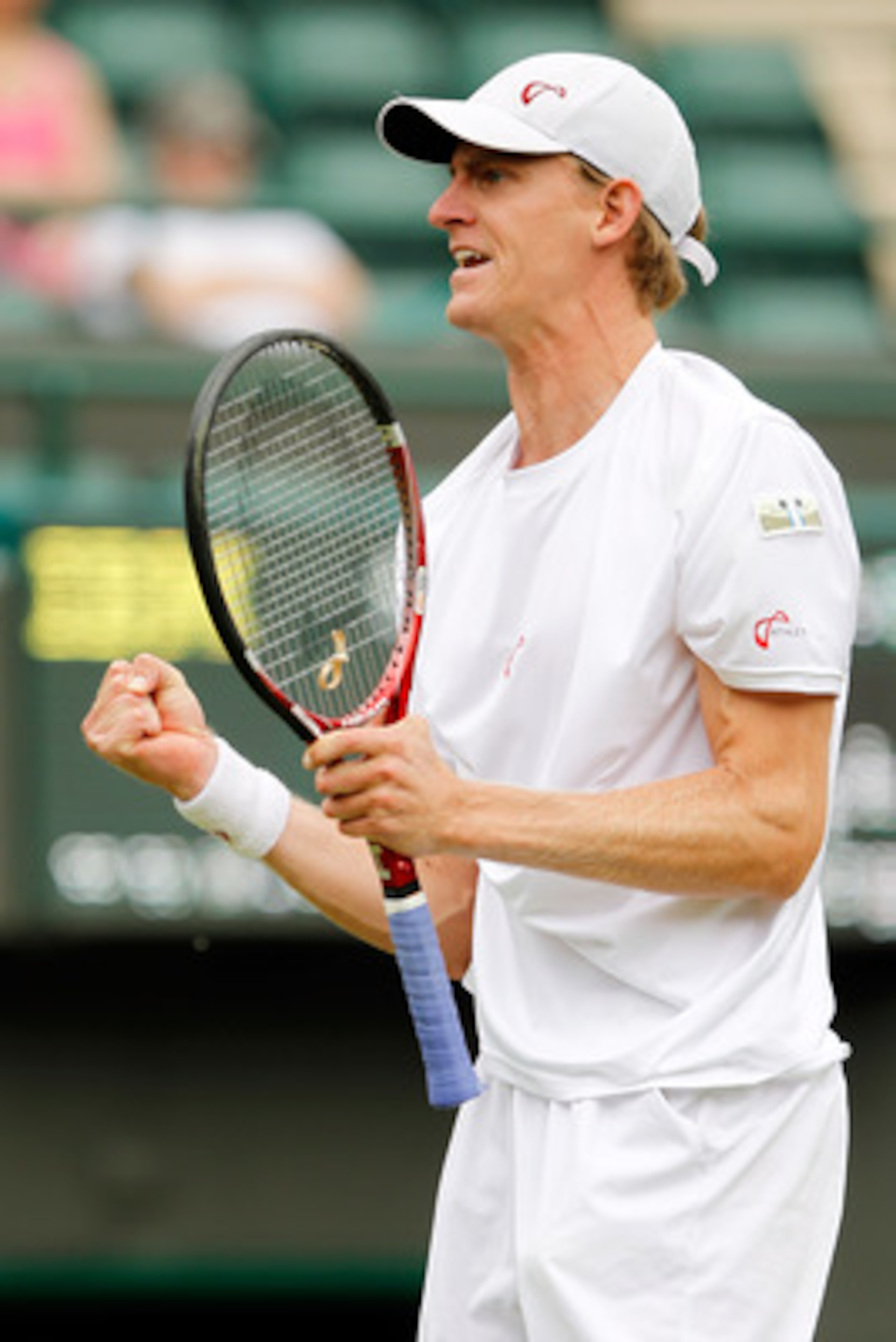 LONDON, ENGLAND - JUNE 21:  Kevin Andersen of South Africa in action during his first round match against Nikolay Davydenko of Russia on Day One of the Wimbledon Lawn Tennis Championships at the All England Lawn Tennis and Croquet Club on June 21, 2010 in