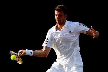 LONDON, ENGLAND - JUNE 23:  Daniel Brands of Germany in action during his second round match against Nikolay Davydenko of Russia on Day Three of the Wimbledon Lawn Tennis Championships at the All England Lawn Tennis and Croquet Club on June 23, 2010 in Lo