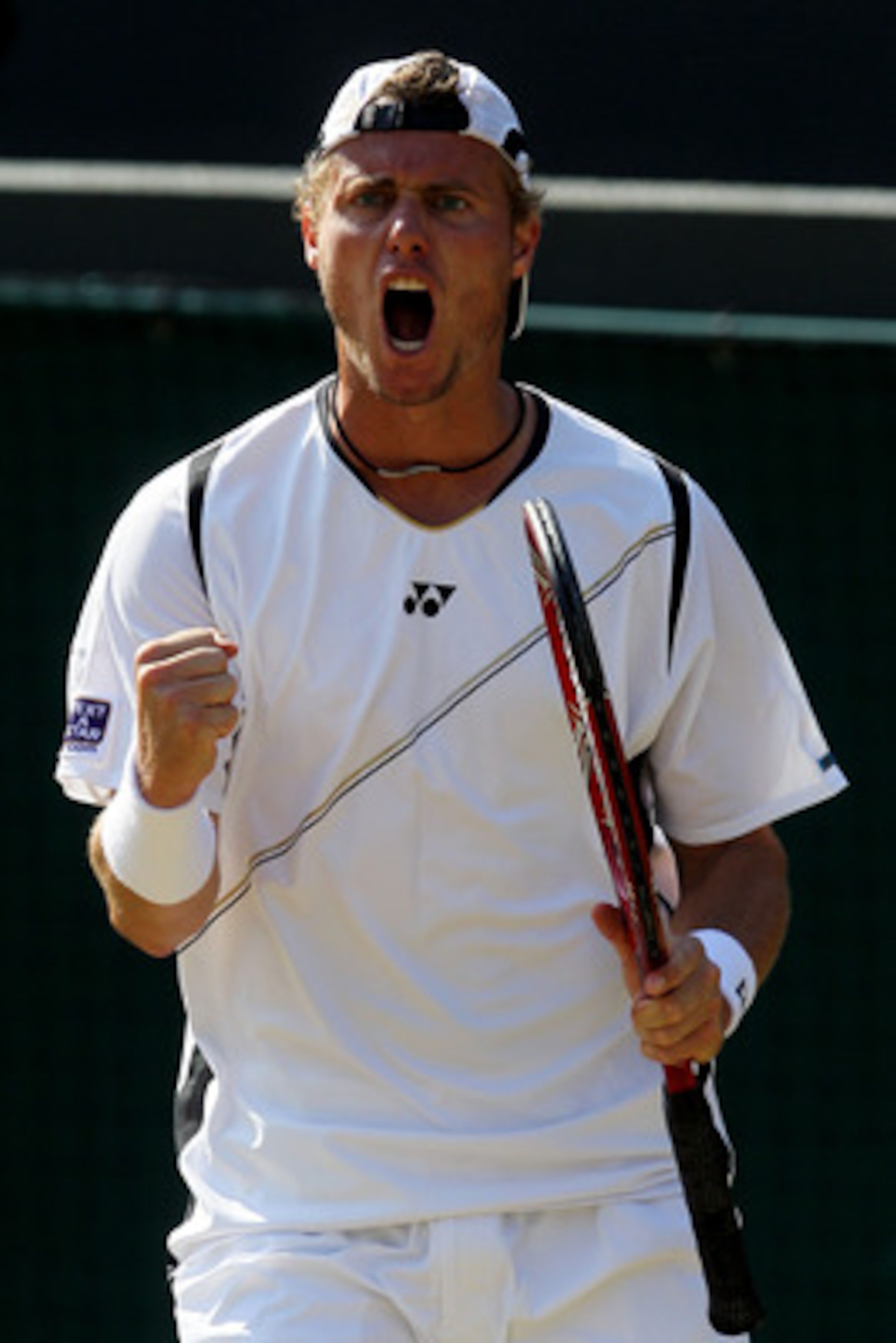 LONDON, ENGLAND - JUNE 28:  Lleyton Hewitt of Australia celebrates a point during his match against Novak Djokovic of Serbia on Day Seven of the Wimbledon Lawn Tennis Championships at the All England Lawn Tennis and Croquet Club on June 28, 2010 in London