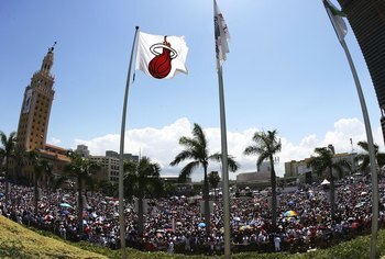 MIAMI - JUNE 23:  An estimated crowd of 250,000 people showed up to help celebrate with the Miami Heat during the victory parade and celebration at American Airlines Arena on June 23, 2006 in Miami, Florida. NOTE TO USER: User expressly acknowledges and a