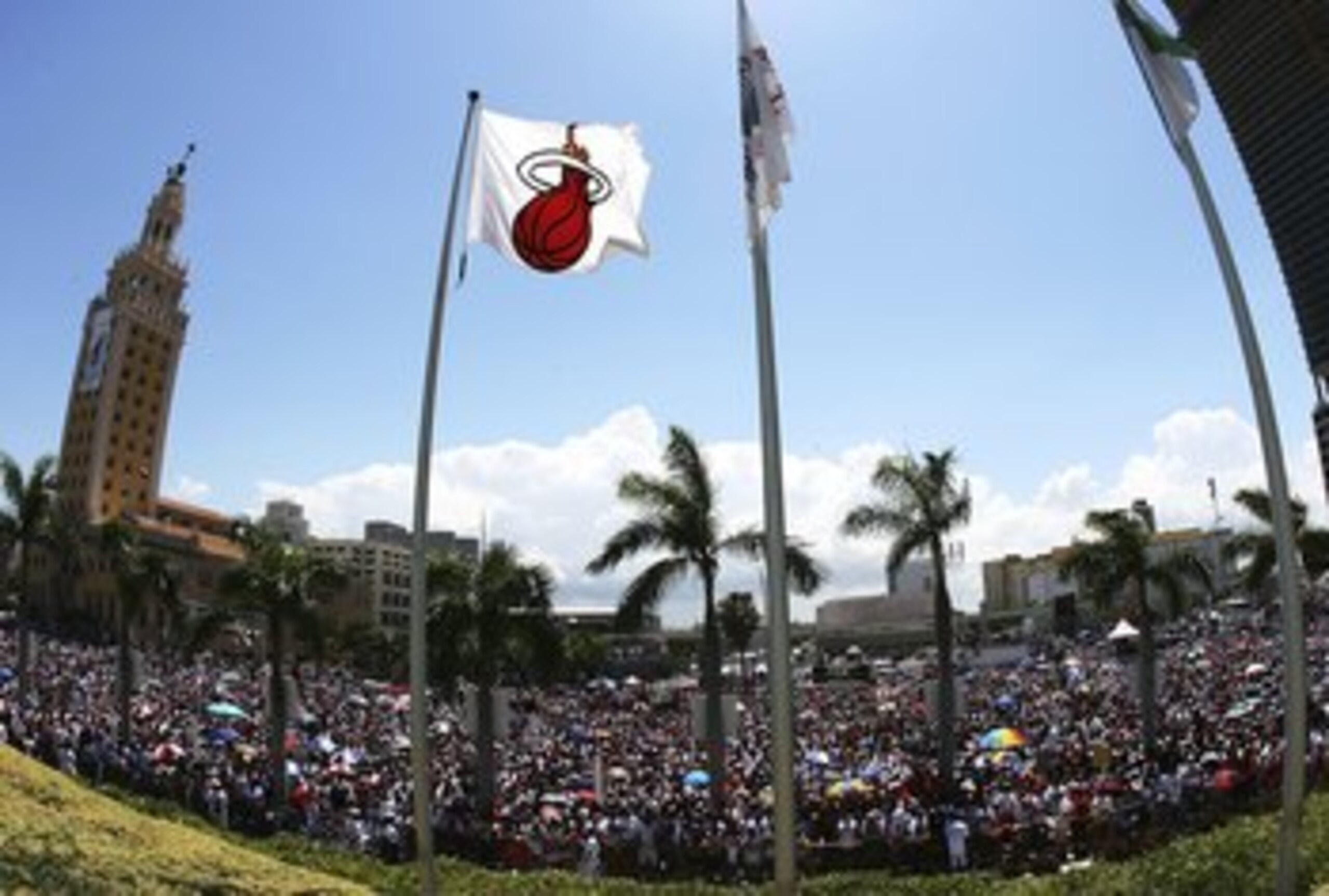 MIAMI - JUNE 23:  An estimated crowd of 250,000 people showed up to help celebrate with the Miami Heat during the victory parade and celebration at American Airlines Arena on June 23, 2006 in Miami, Florida. NOTE TO USER: User expressly acknowledges and a