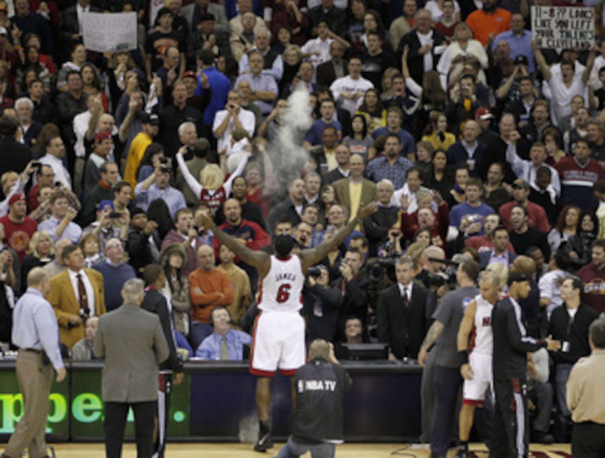 CLEVELAND, OH - DECEMBER 02:  LeBron James #6 of the Miami Heat throws powder in the air prior to playing the Cleveland Cavaliers at Quicken Loans Arena on December 2, 2010 in Cleveland, Ohio. NOTE TO USER: User expressly acknowledges and agrees that, by 