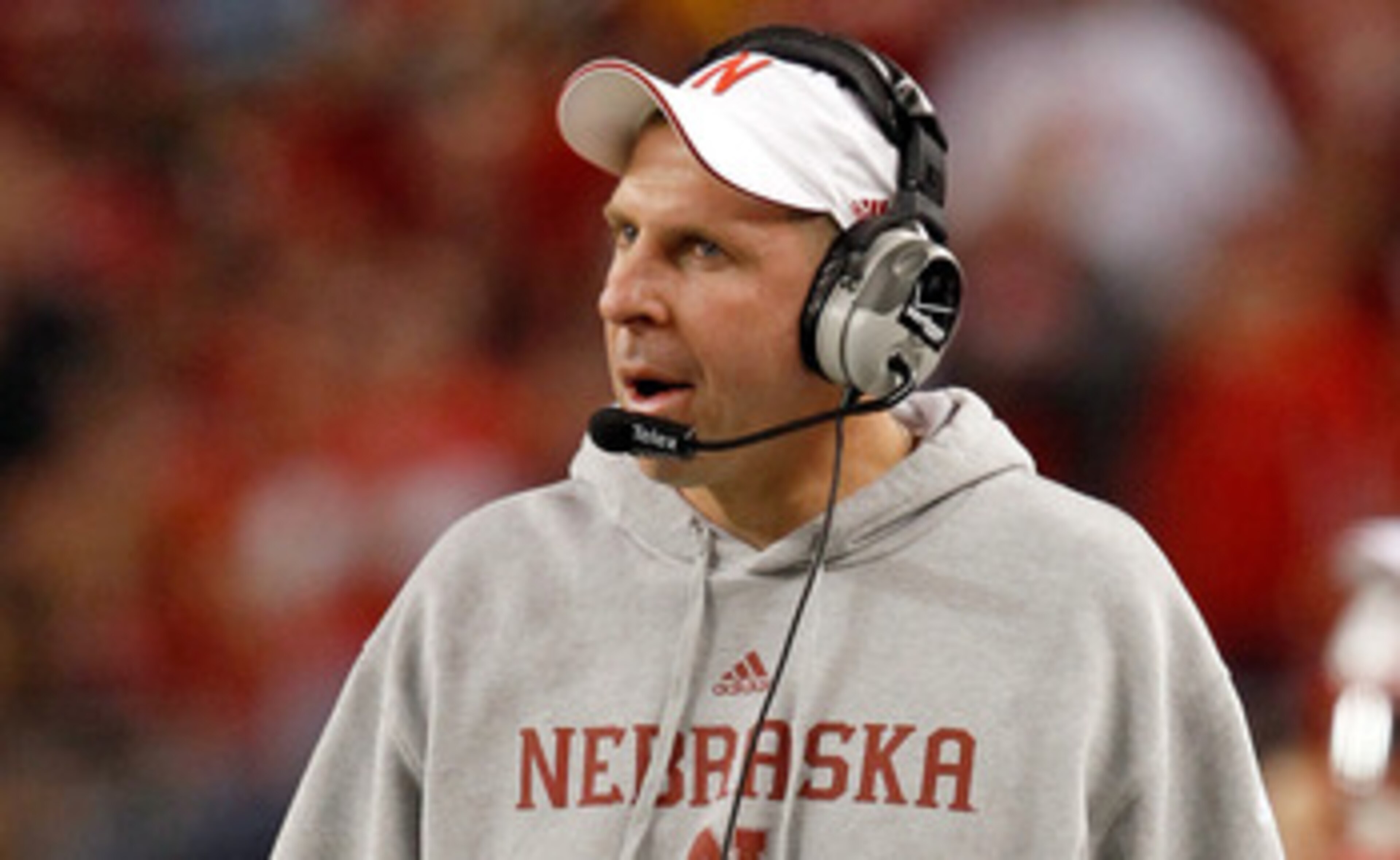 ARLINGTON, TX - DECEMBER 04:  Head coach Bo Pelini of the Nebraska Cornhuskers leads his team against the Oklahoma Sooners at Cowboys Stadium on December 4, 2010 in Arlington, Texas. The Sooners beat the Cornhuskers 23-20.  (Photo by Tom Pennington/Getty 