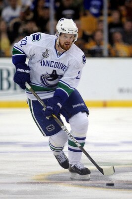 BOSTON, MA - JUNE 08:  Daniel Sedin #22 of the Vancouver Canucks skates against the Boston Bruins during Game Four of the 2011 NHL Stanley Cup Final at TD Garden on June 8, 2011 in Boston, Massachusetts.  (Photo by Harry How/Getty Images)