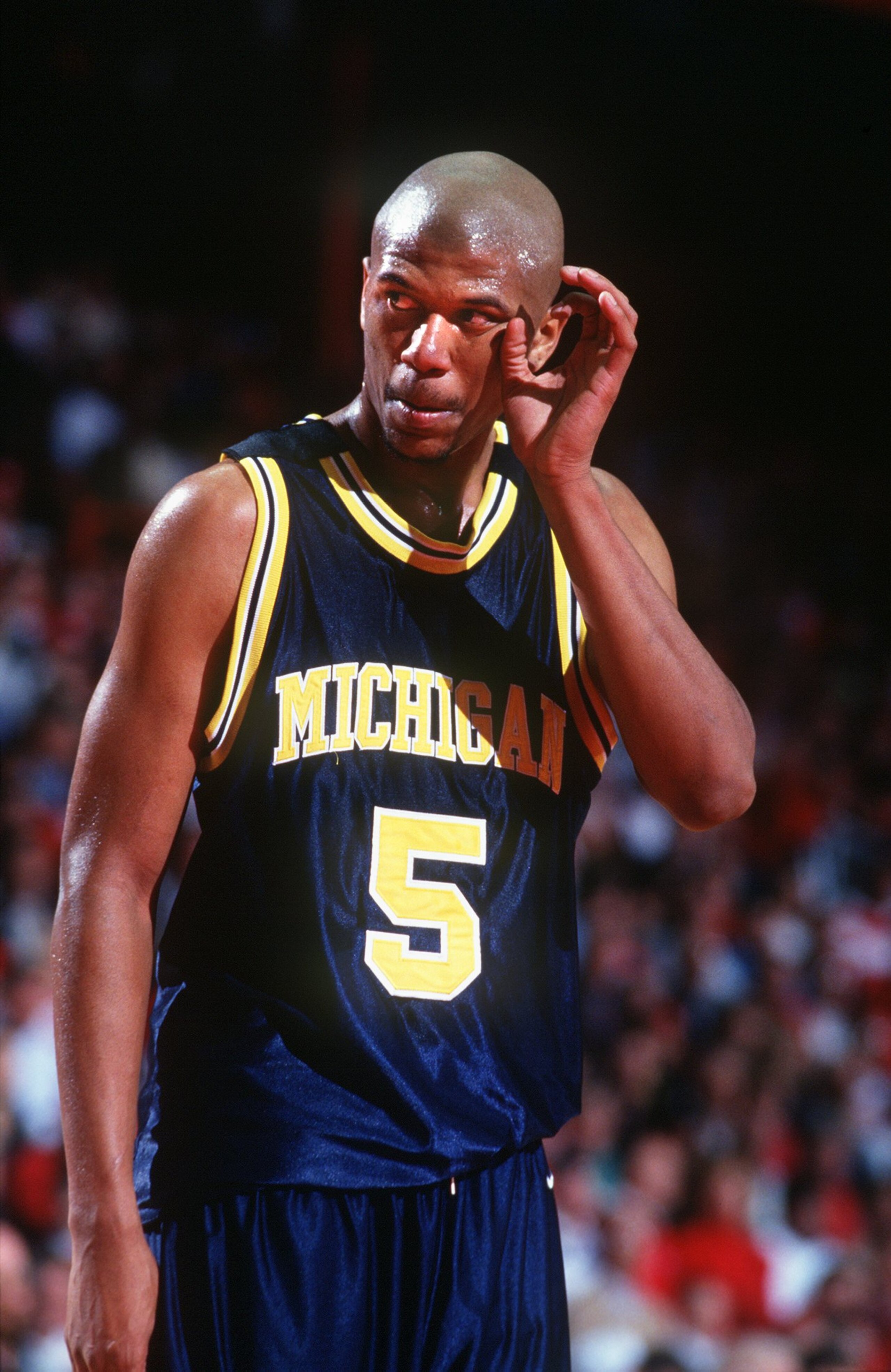 2 MAR 1994: A CANDID PORTRAIT OF MICHIGAN GUARD JALEN ROSE ON THE COURT DURING A 71-58 LOSS TO WISCONSIN. Mandatory Credit: Todd Rosenberg/ALLSPORT 2 MAR 1994: A CANDID PORTRAIT OF MICHIGAN GUARD JALEN ROSE ON THE COURT DURING A 71-58 LOSS TO WISCONSIN. Mandatory Credit: Todd Rosenberg/ALLSPORT