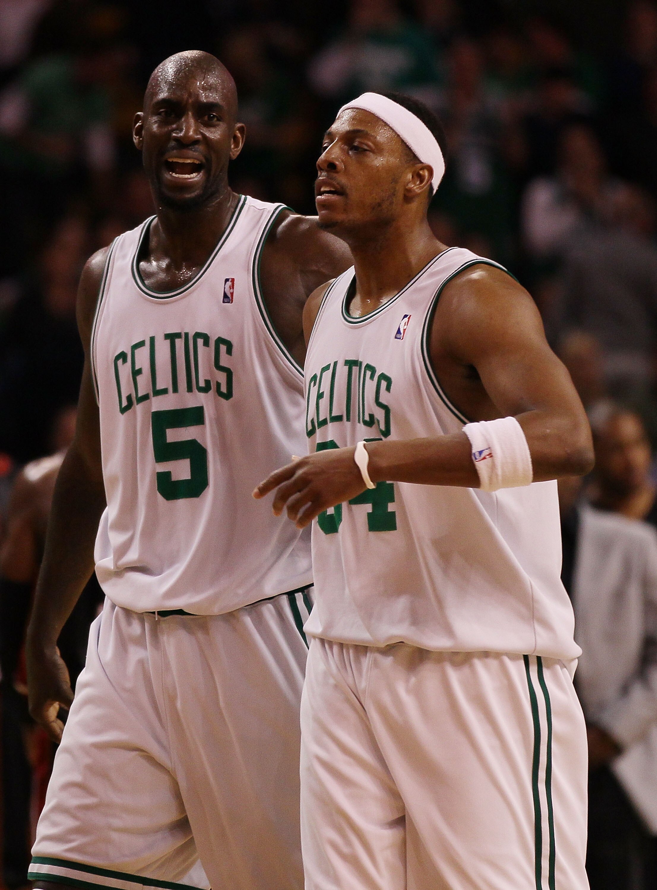 BOSTON - APRIL 27:  Kevin Garnett #5 and Paul Pierce #34 of the Boston Celtics head for the bench during a time out against the Miami Heat during Game Five of the Eastern Conference Quarterfinals of the 2010 NBA playoffs at the TD Garden on April 27, 2010