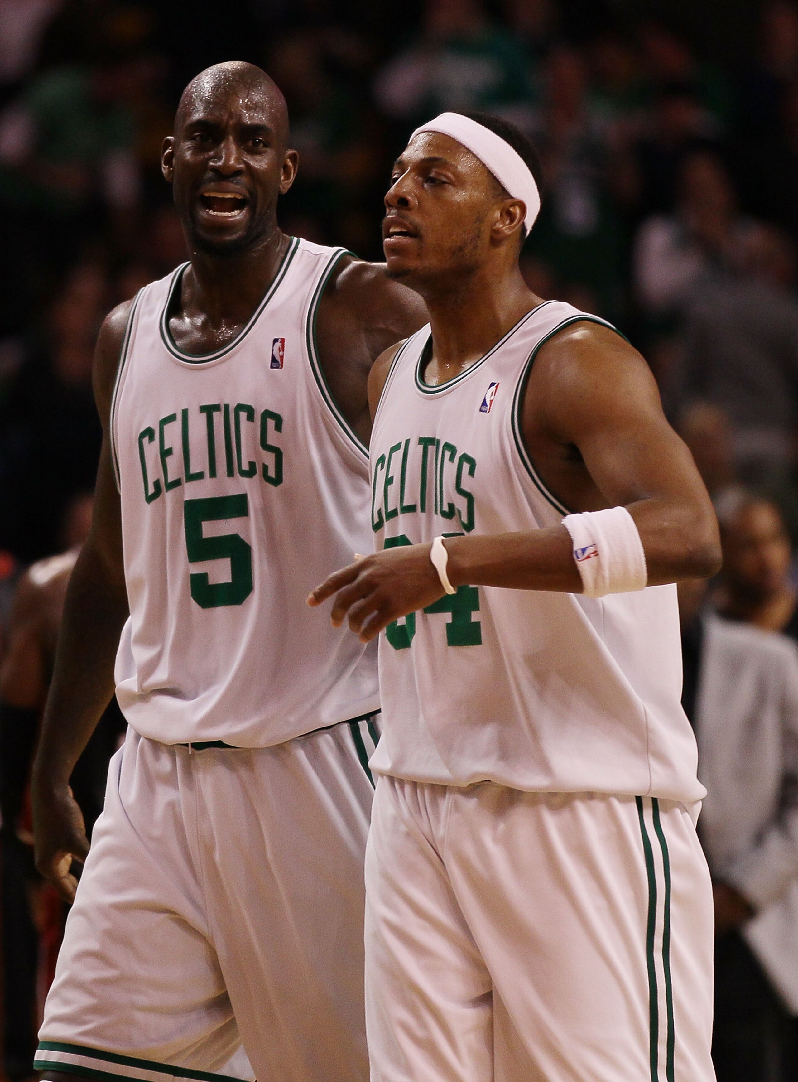 BOSTON - APRIL 27: Kevin Garnett #5 and Paul Pierce #34 of the Boston Celtics head for the bench during a time out against the Miami Heat during Game Five of the Eastern Conference Quarterfinals of the 2010 NBA playoffs at the TD Garden on April 27, 2010 BOSTON - APRIL 27: Kevin Garnett #5 and Paul Pierce #34 of the Boston Celtics head for the bench during a time out against the Miami Heat during Game Five of the Eastern Conference Quarterfinals of the 2010 NBA playoffs at the TD Garden on April 27, 2010