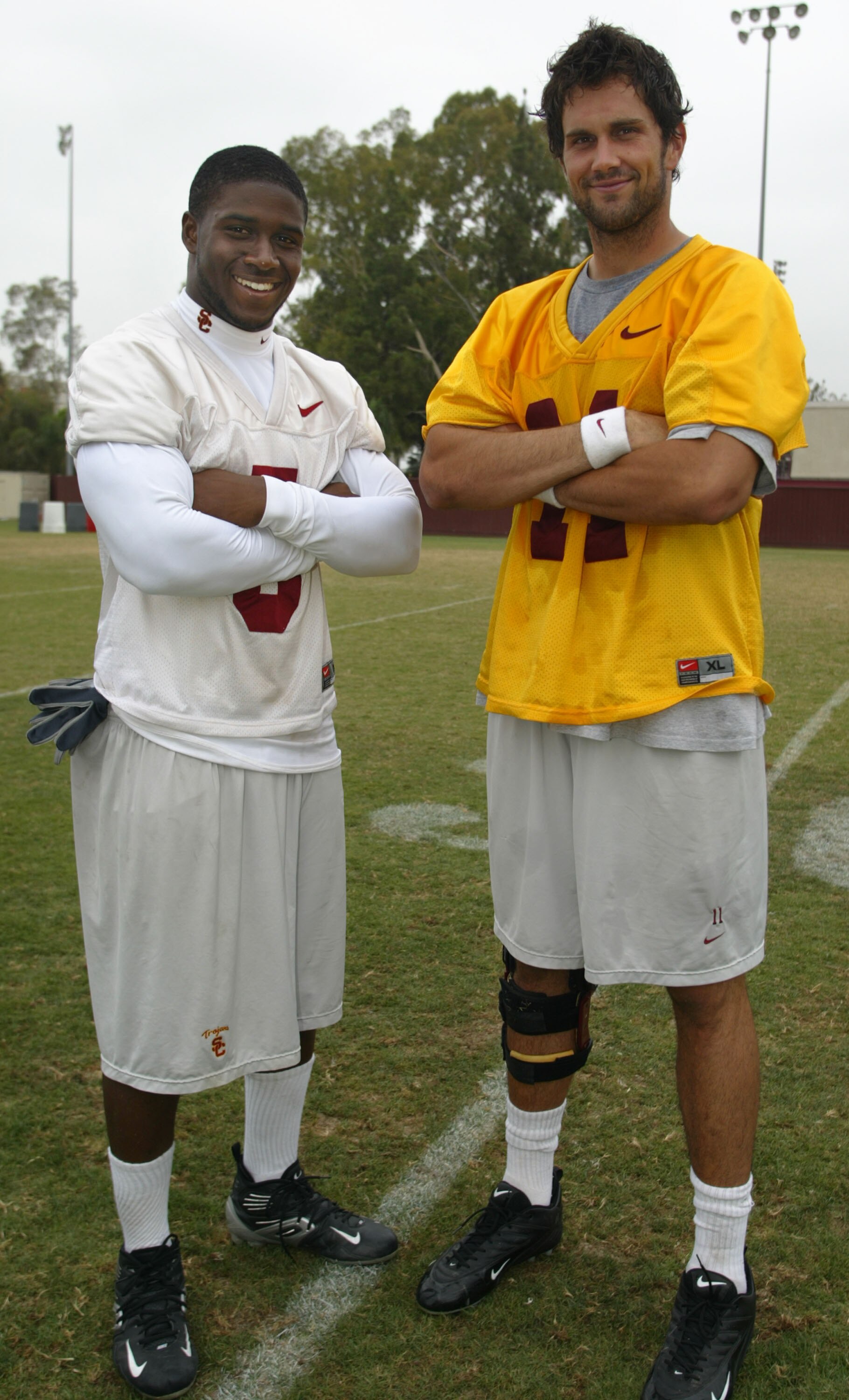 LOS ANGELES - AUGUST 16:  Runningback Reggie Bush and quarterback Matt Leinart of the USC Trojans pose for a portrait during a USC team practice on the USC campus on August 16, 2005 in Los Angeles, California.  (Photo By Christian Petersen/Getty Images)