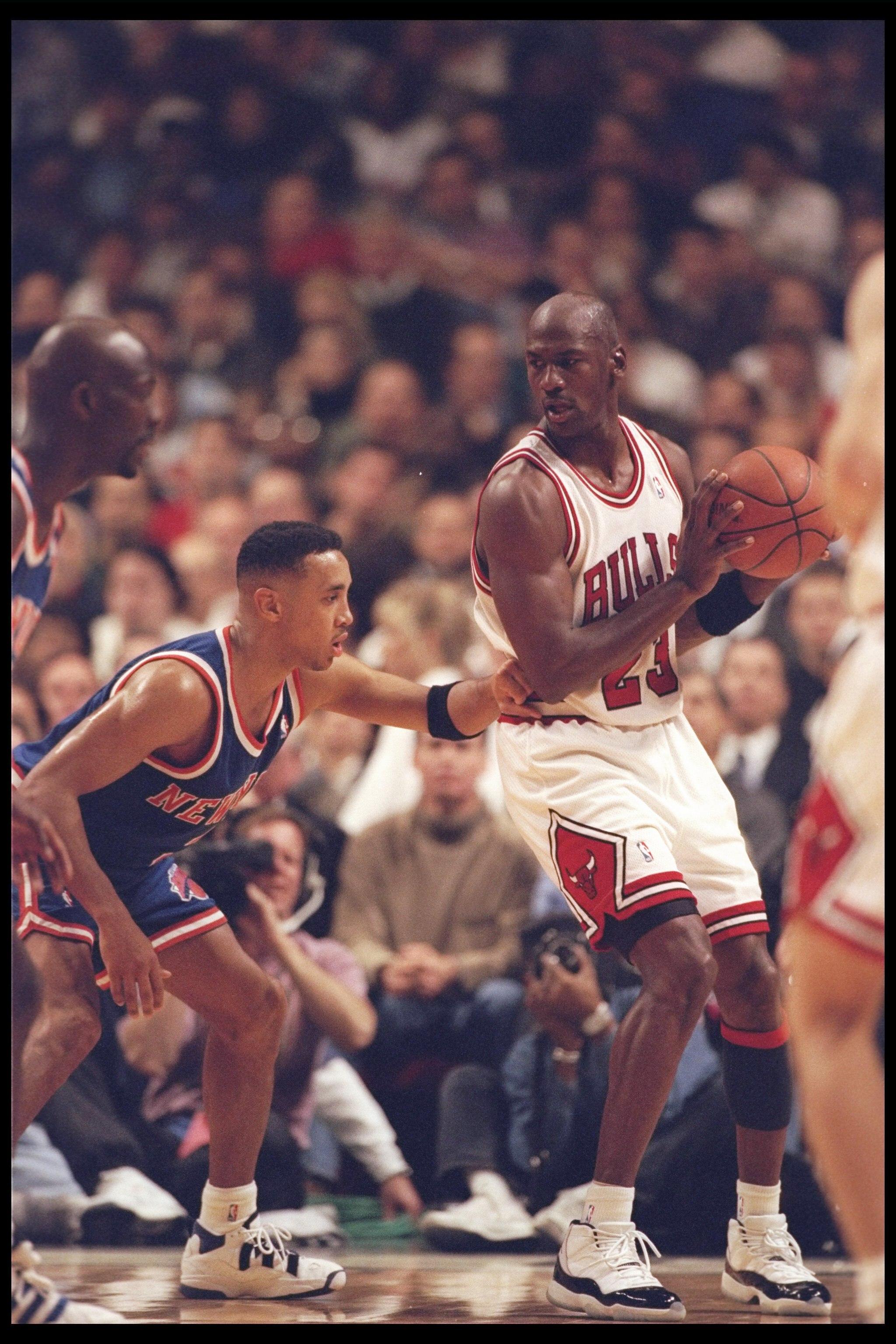 6 Dec 1995:  Guard John Starks of the New York Knicks tries to guard guard Michael Jordan of the Chicago Bulls at the United Center in Chicago, Illinois.  The Bulls won the game 101-94. NOTE TO USER:  It is expressly understood that the only rights Allspo