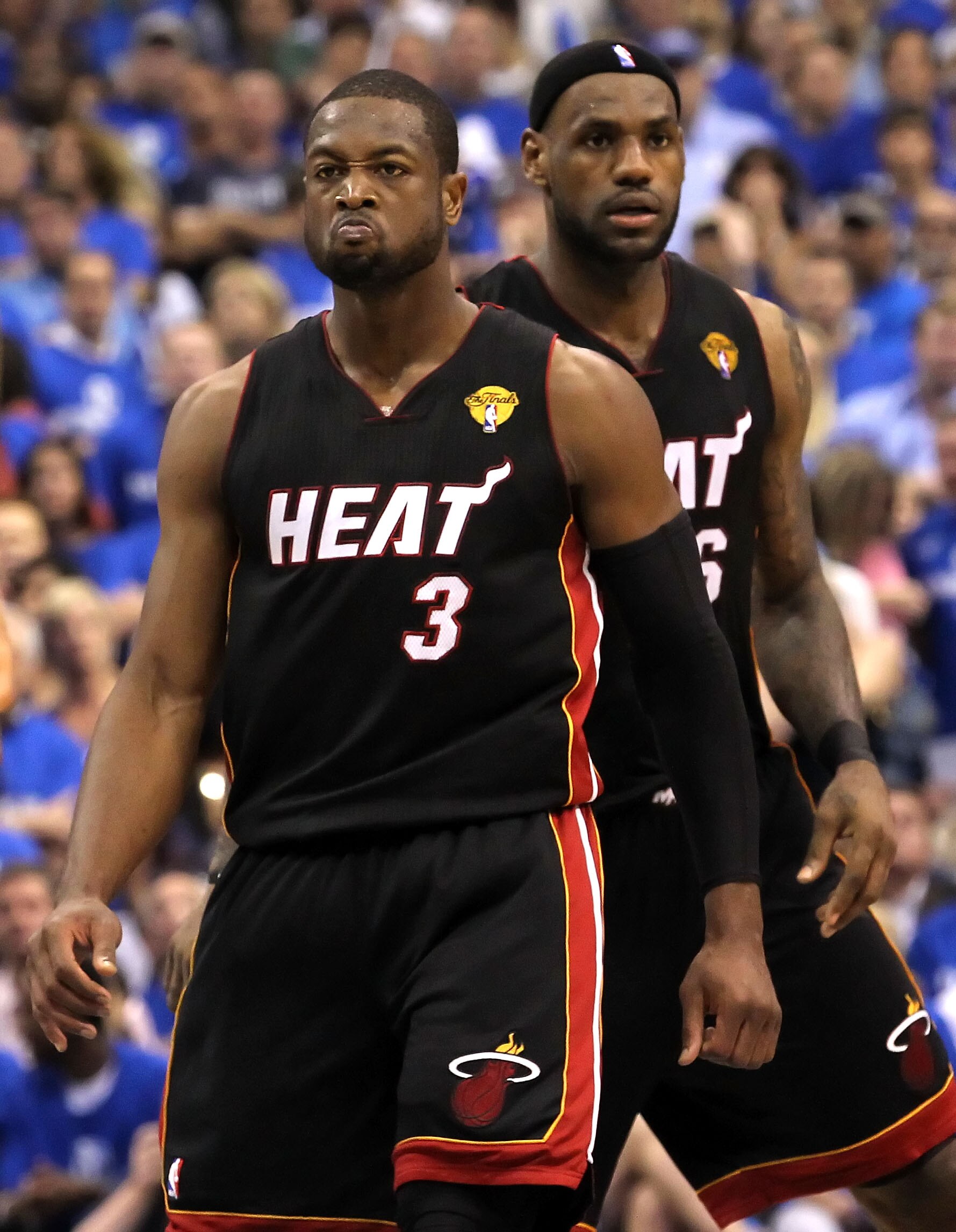 DALLAS, TX - JUNE 09:  Dwyane Wade #3 and LeBron James #6 of the Miami Heat look on in the fourth quarter against the Dallas Mavericks in Game Five of the 2011 NBA Finals at American Airlines Center on June 9, 2011 in Dallas, Texas.  NOTE TO USER: User ex