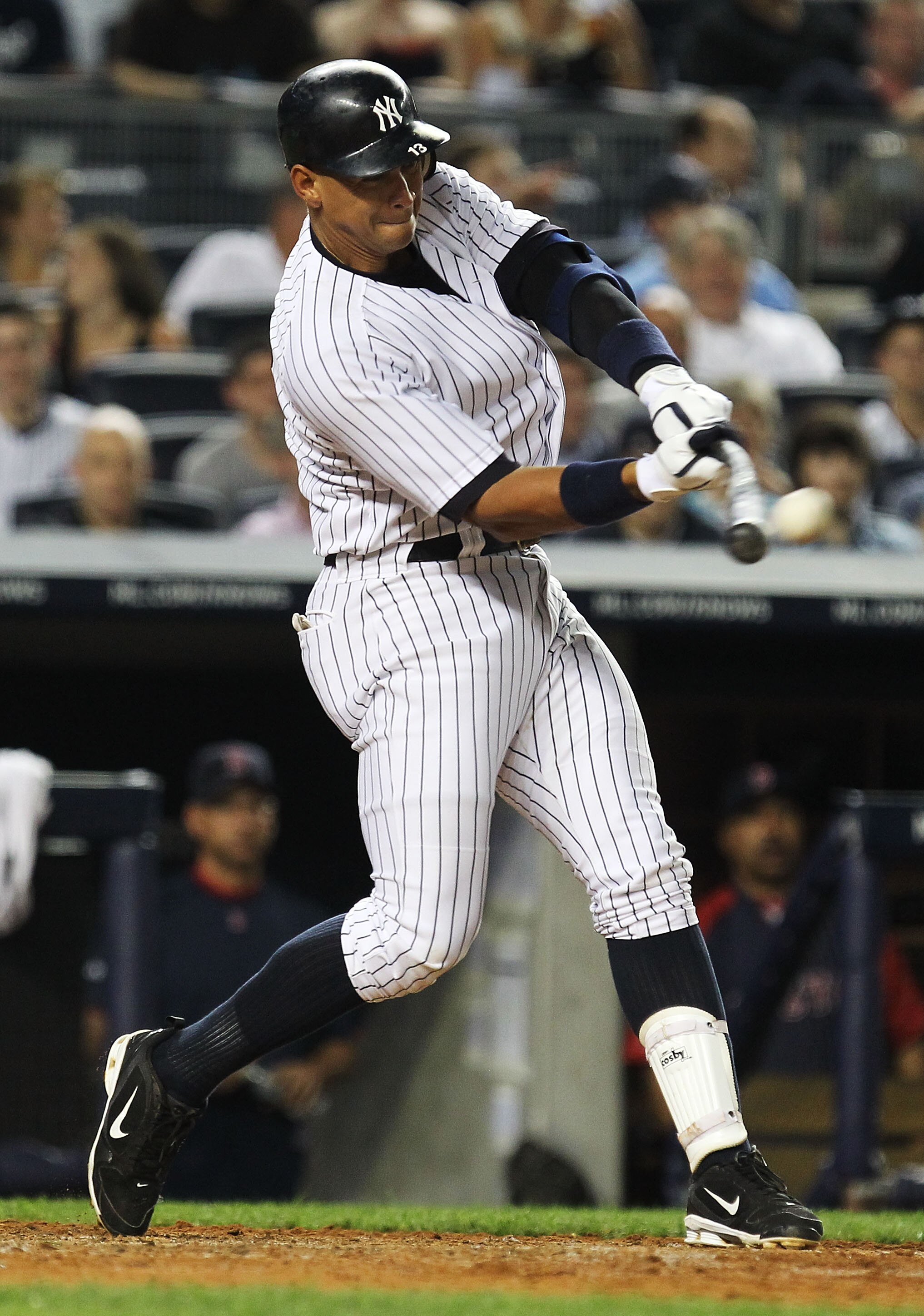 NEW YORK, NY - JUNE 08:  Alex Rodriguez #13 of the New York Yankees flies out against the Boston Red Sox during their game on June 8, 2011 at Yankee Stadium in the Bronx borough of New York City.  (Photo by Al Bello/Getty Images)