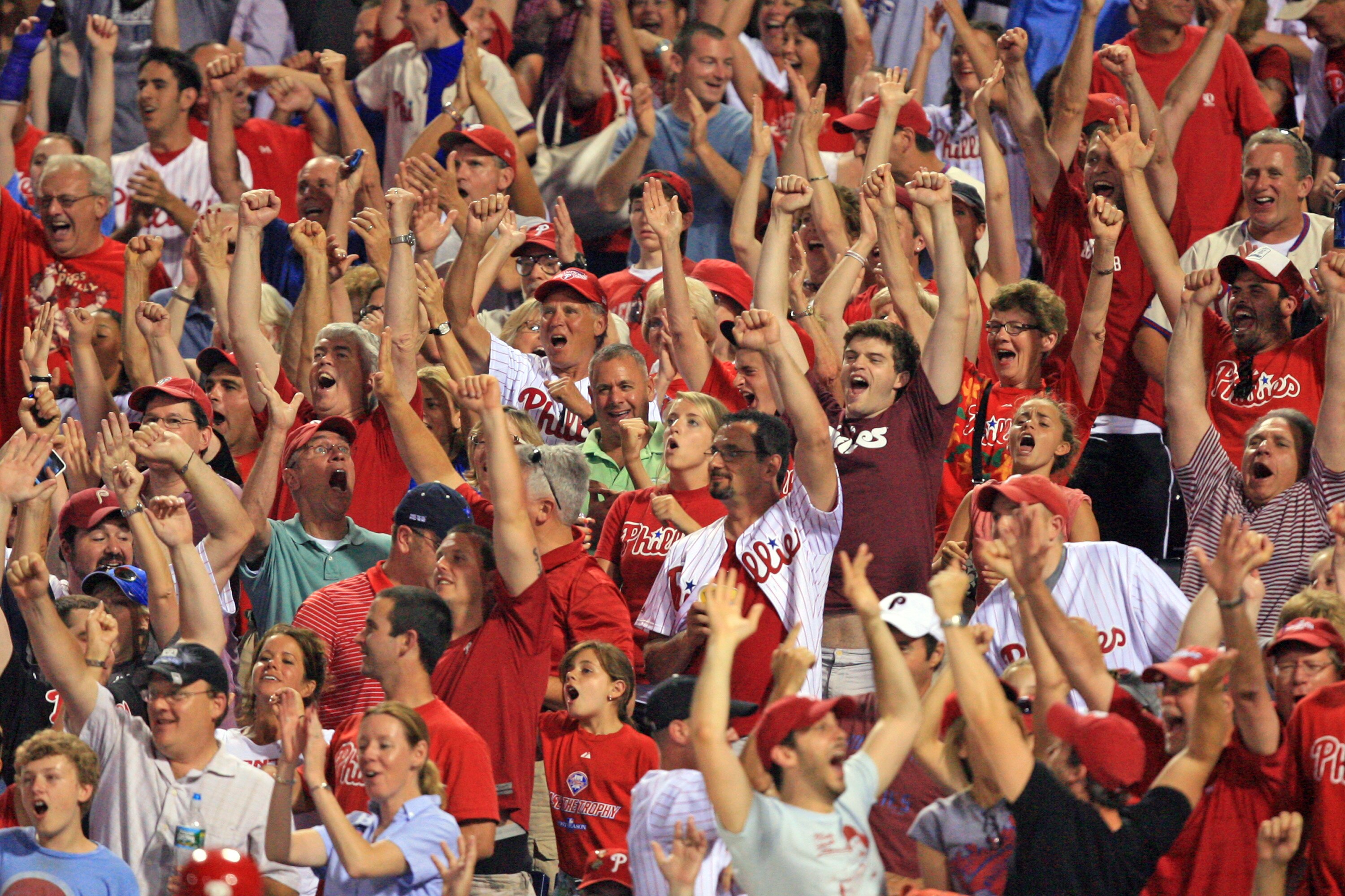PHILADELPHIA - JUNE 10: Philadelphia Phillies fans cheer for Placido Polanco's grand slam home run during a game against the Chicago Cubs at Citizens Bank Park on June 10, 2011 in Philadelphia, Pennsylvania. The Phillies won 7-5. (Photo by Hunter Martin/G
