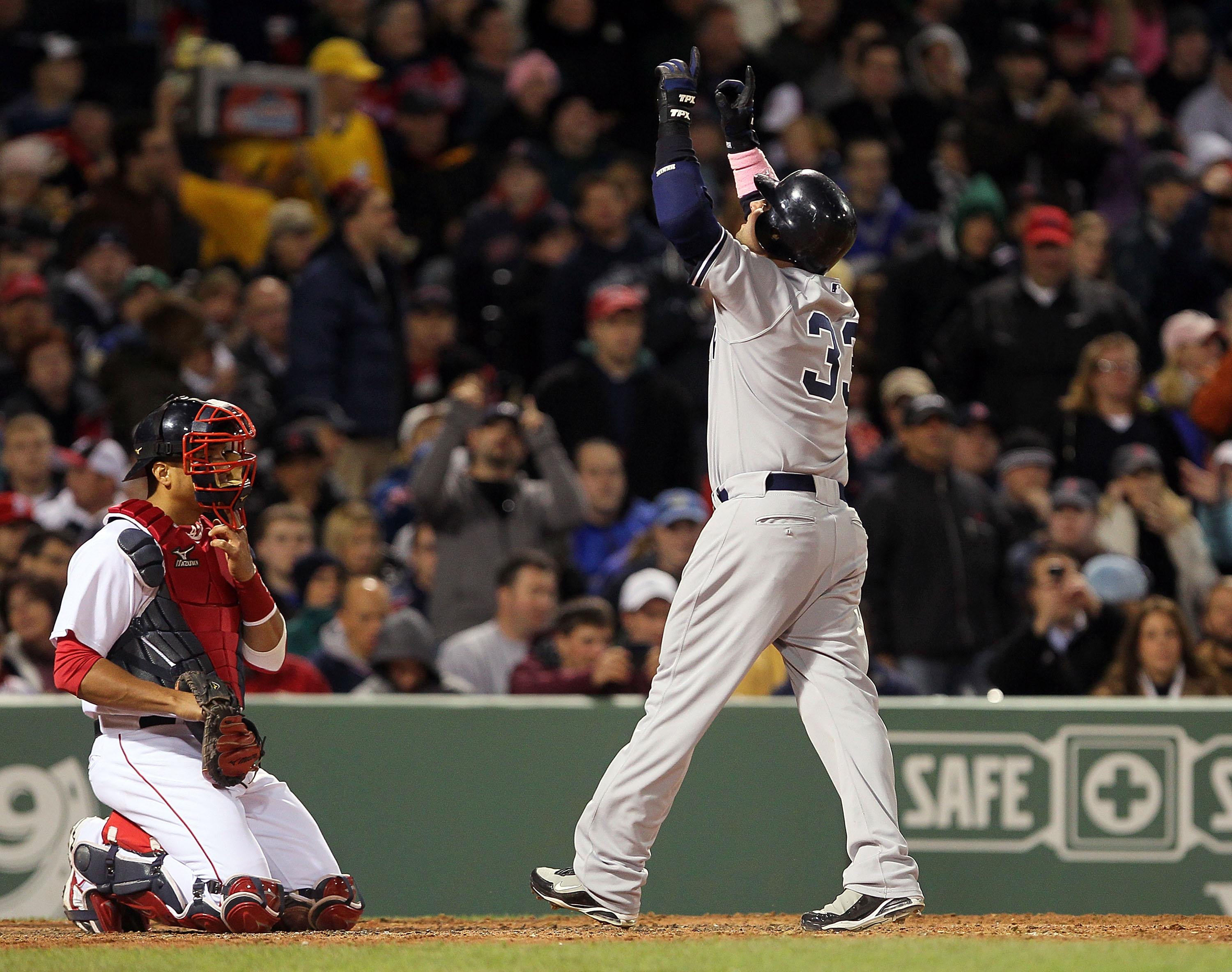 BOSTON - MAY 9:  Nick Swisher #33 of the New York Yankees reacts after hitting a home run against the Boston Red Sox at Fenway Park on May 9, 2010 in Boston, Massachusetts. (Photo by Jim Rogash/Getty Images)