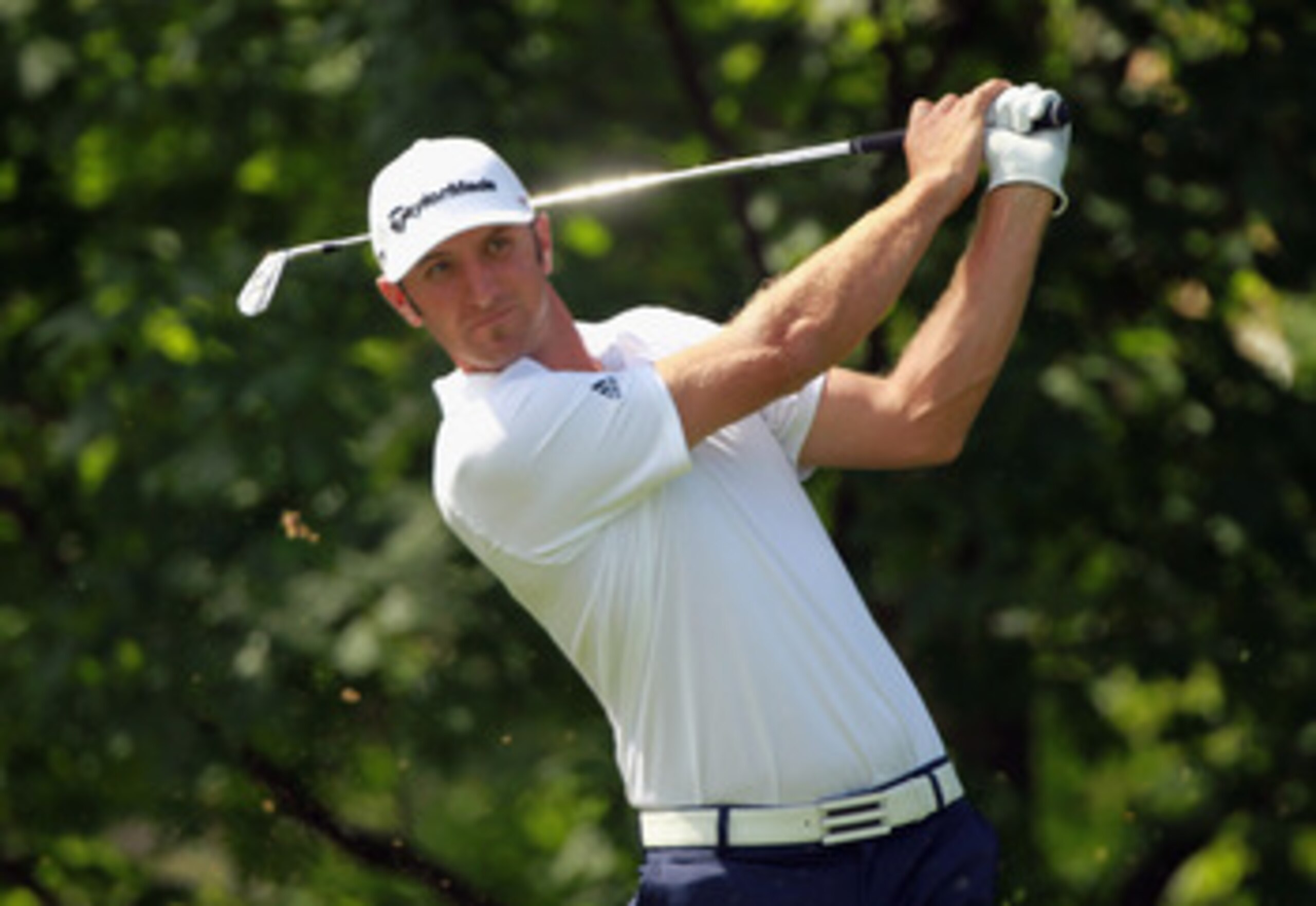 DUBLIN, OH - JUNE 02: Dustin Johnson hits his tee shot on the 14th hole during the first round of the Memorial Tournament presented by Nationwide Insurance at the Muirfield Village Golf Club on June 2, 2011 in Dublin, Ohio. (Photo by Scott Halleran/Gett DUBLIN, OH - JUNE 02: Dustin Johnson hits his tee shot on the 14th hole during the first round of the Memorial Tournament presented by Nationwide Insurance at the Muirfield Village Golf Club on June 2, 2011 in Dublin, Ohio. (Photo by Scott Halleran/Gett