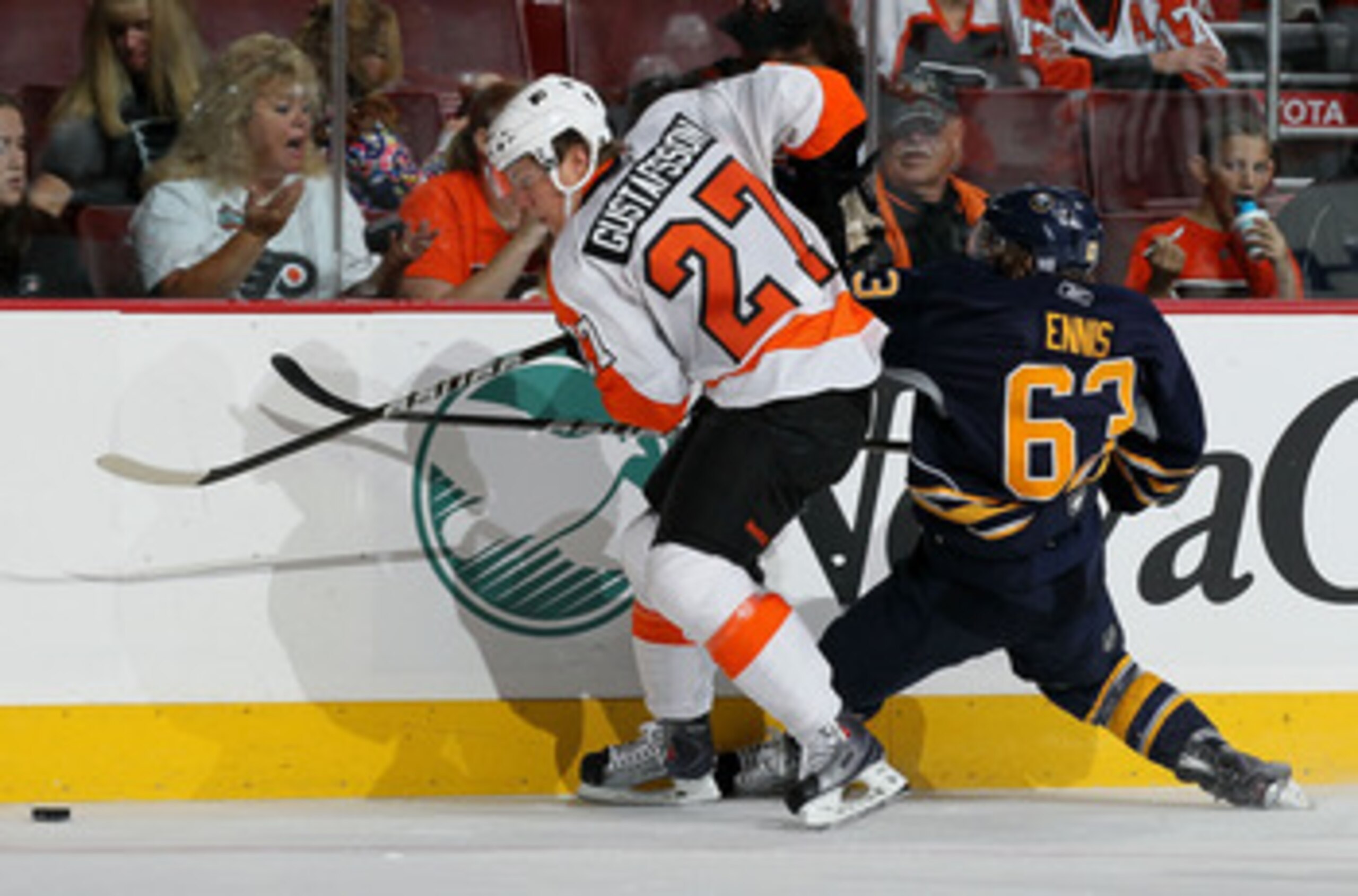 PHILADELPHIA - OCTOBER 01: Erik Gustafsson #27 of the Philadelphia Flyers steals the puck from Tyler Ennis #63 of the Buffalo Sabres on October 1, 2010 at Wells Fargo Center in Philadelphia, Pennsylvania. The Flyers defeated the Sabres 3-1. (Photo by Ji PHILADELPHIA - OCTOBER 01: Erik Gustafsson #27 of the Philadelphia Flyers steals the puck from Tyler Ennis #63 of the Buffalo Sabres on October 1, 2010 at Wells Fargo Center in Philadelphia, Pennsylvania. The Flyers defeated the Sabres 3-1. (Photo by Ji