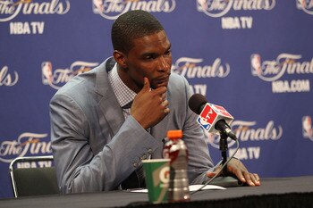 MIAMI, FL - JUNE 12:  Chris Bosh #1 of the Miami Heat answers questions from the media at a post game press conference after the Dallas Mavericks won 105-95 in Game Six of the 2011 NBA Finals at American Airlines Arena on June 12, 2011 in Miami, Florida.