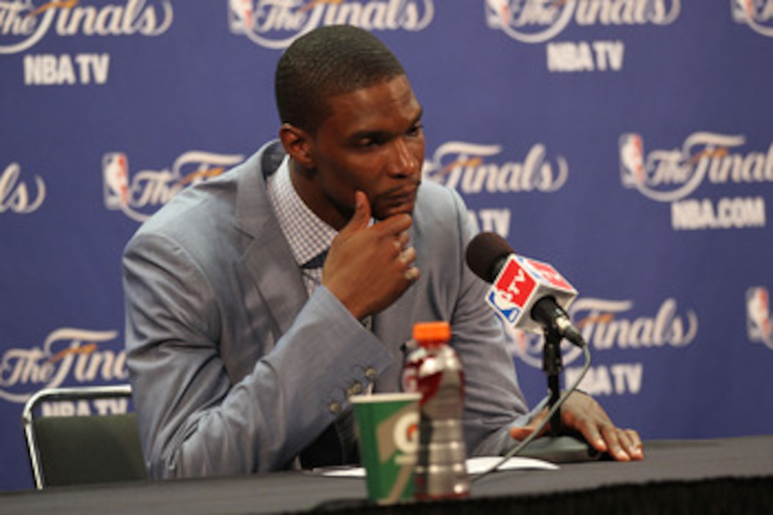 MIAMI, FL - JUNE 12:  Chris Bosh #1 of the Miami Heat answers questions from the media at a post game press conference after the Dallas Mavericks won 105-95 in Game Six of the 2011 NBA Finals at American Airlines Arena on June 12, 2011 in Miami, Florida.