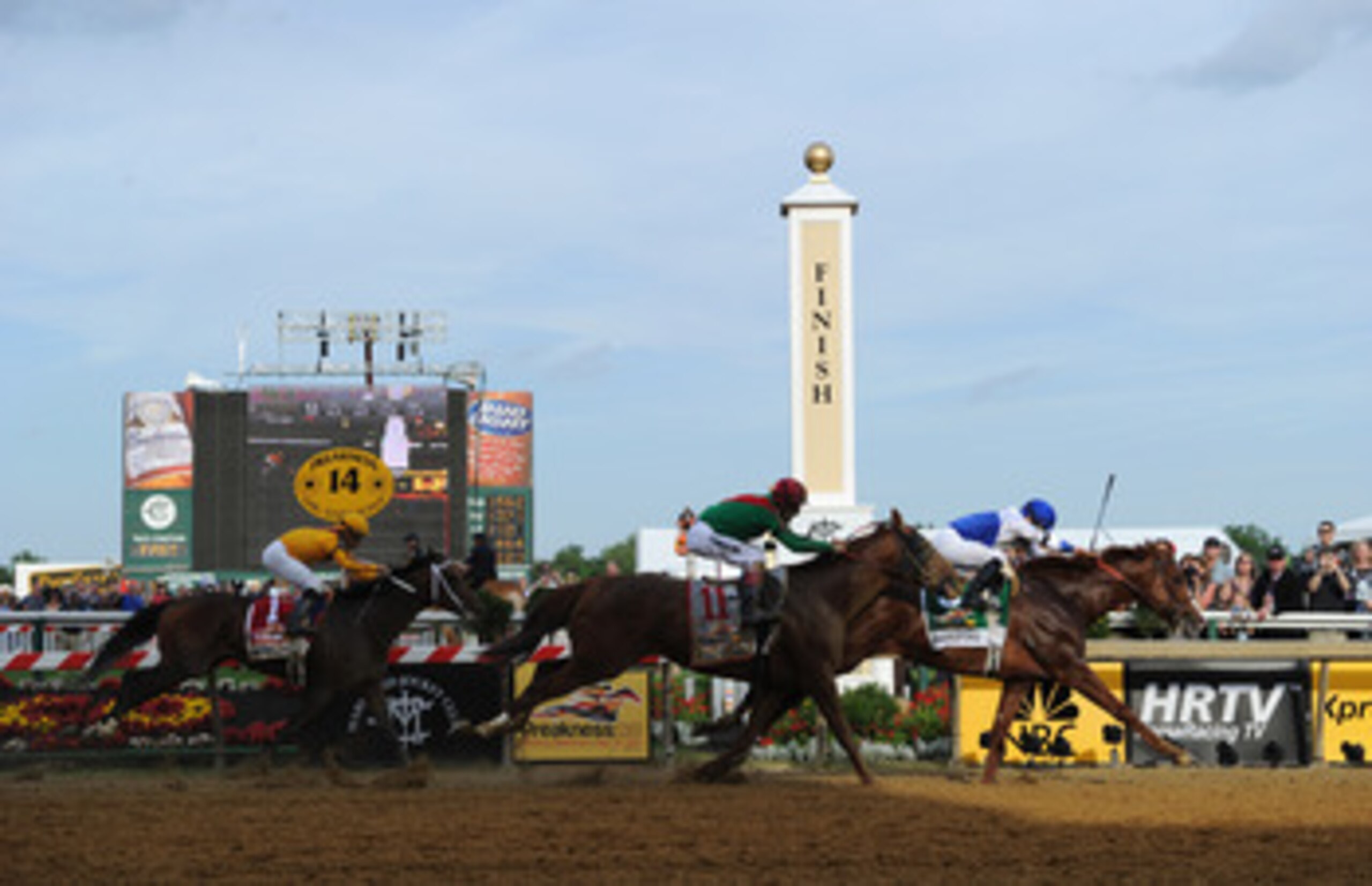 BALTIMORE, MD - MAY 21:  Jockey Jesus Castanon guides Shackleford #5 to victory over Animal Kingdom and jocky John Velazquez #11  and Astrology with jockey Mike Smith #1 to win the 136th running of the Preakness Stakes at Pimlico Race Course on May 21, 20