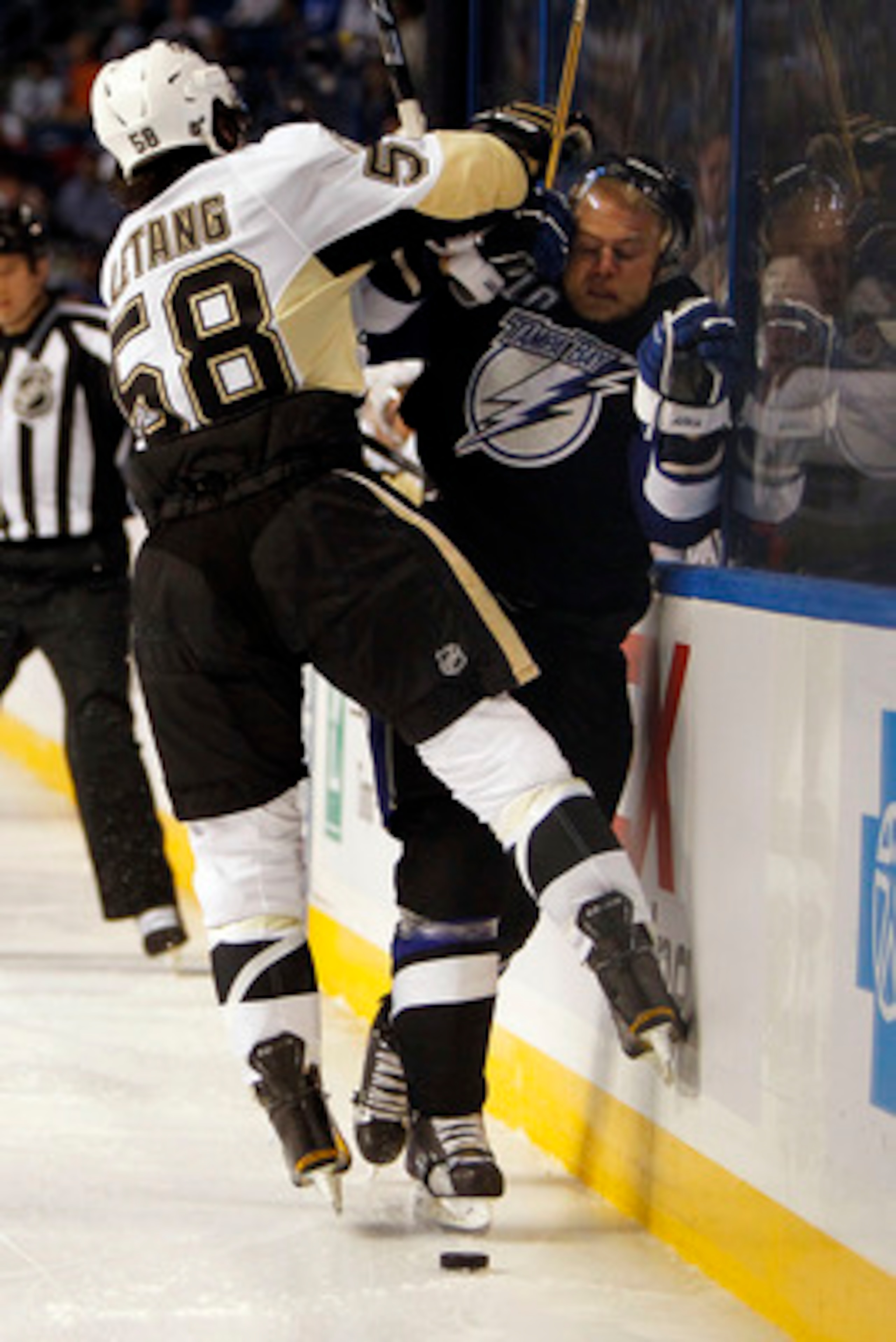 TAMPA, FL - APRIL 25: Kris Letang #58 of the Pittsburgh Penguins checks Sean Bergenheim #10 of the Tampa Bay Lightning in Game Six of the Eastern Conference Quarterfinals during the 2011 NHL Stanley Cup Playoffs at the St. Pete Times Forum on April 25, 20 TAMPA, FL - APRIL 25: Kris Letang #58 of the Pittsburgh Penguins checks Sean Bergenheim #10 of the Tampa Bay Lightning in Game Six of the Eastern Conference Quarterfinals during the 2011 NHL Stanley Cup Playoffs at the St. Pete Times Forum on April 25, 20