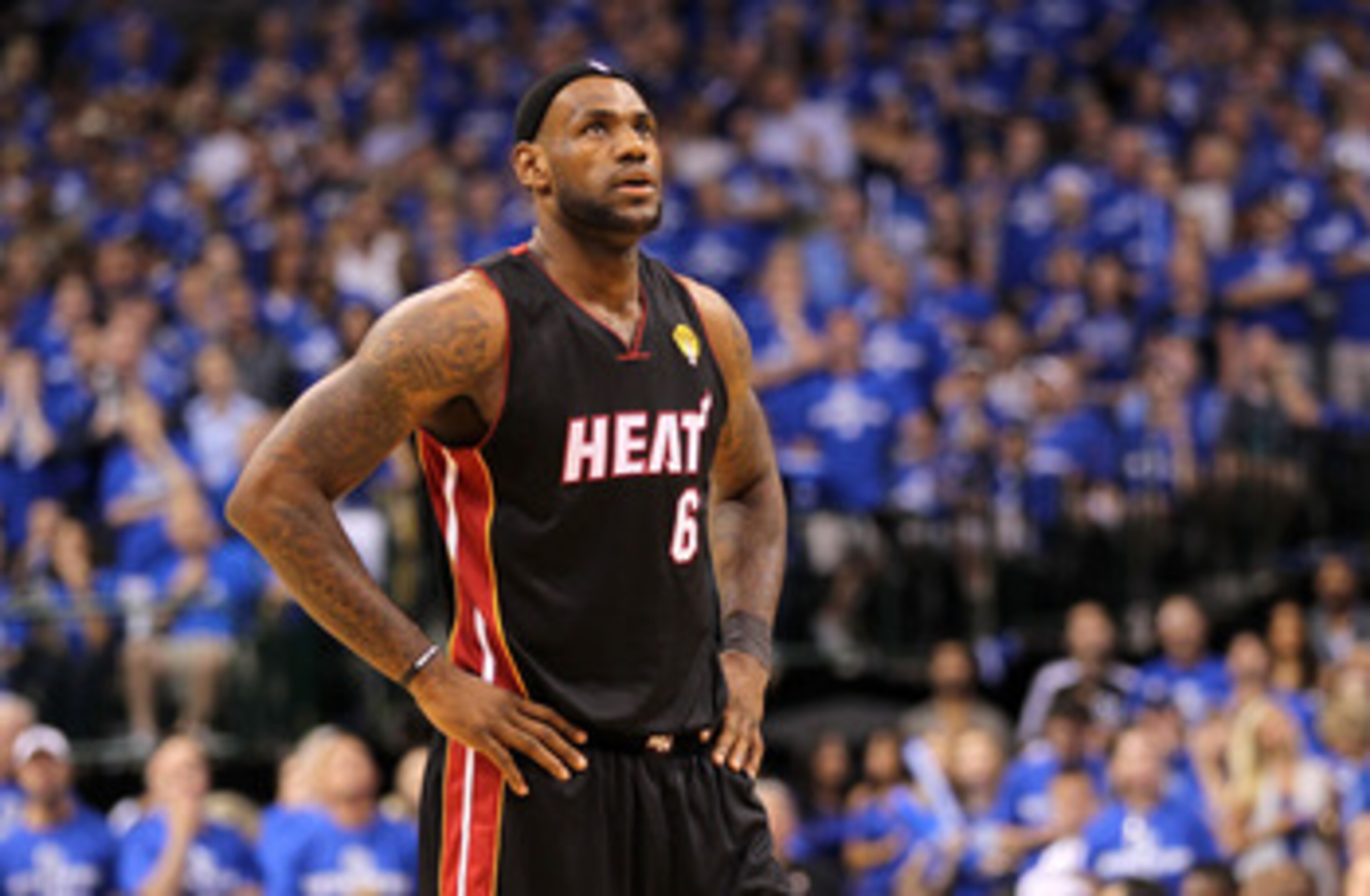DALLAS, TX - JUNE 09:  LeBron James #6 of the Miami Heat looks on against the Dallas Mavericks in Game Five of the 2011 NBA Finals at American Airlines Center on June 9, 2011 in Dallas, Texas.  NOTE TO USER: User expressly acknowledges and agrees that, by