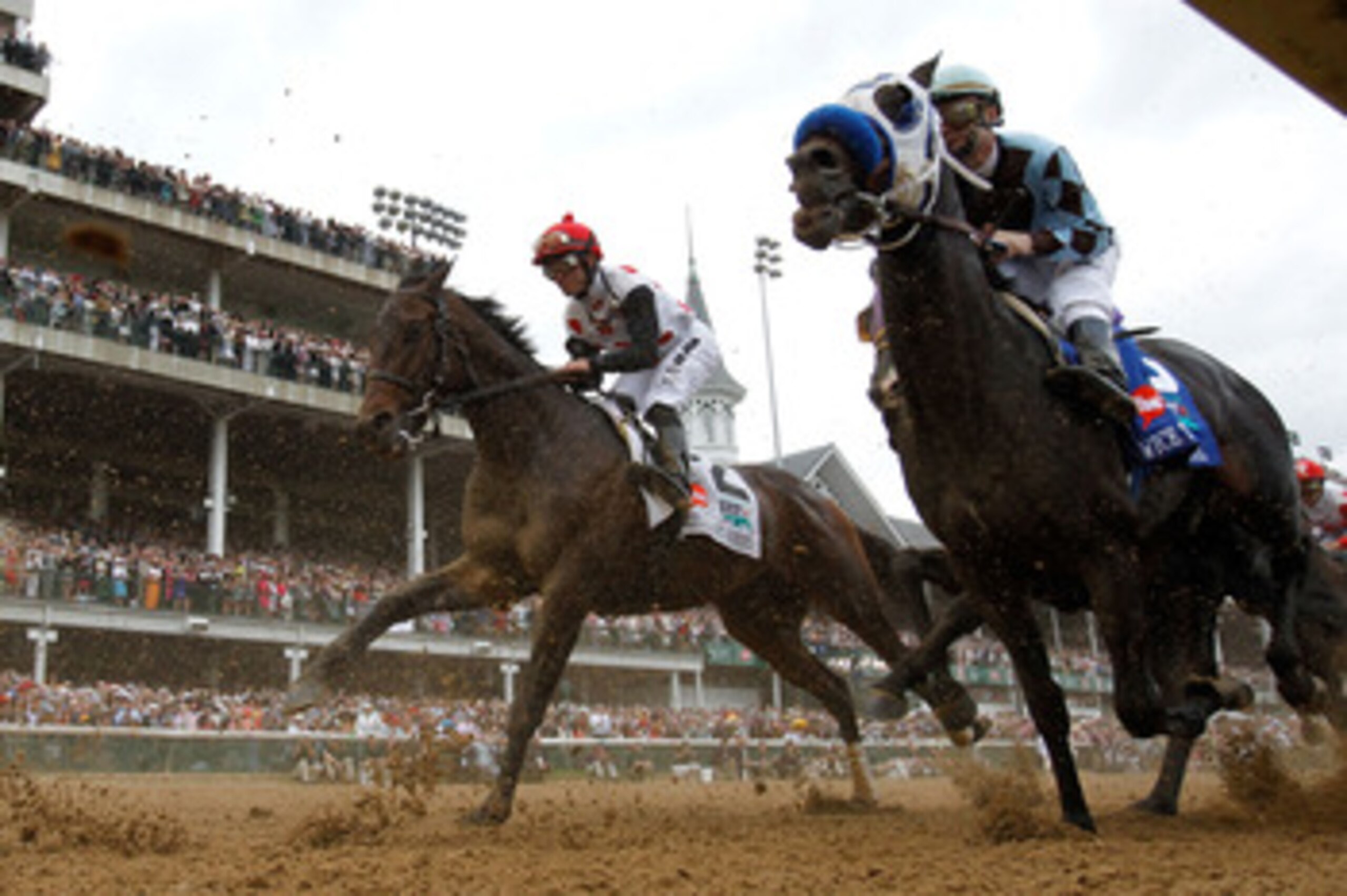 LOUISVILLE, KY - MAY 07:  (L-R) Jockey Joel Rosario, riding Brilliant Speed #2, races against jockey Calvin Borel, riding Twice the Appeal #3, during the 137th Kentucky Derby at Churchill Downs on May 7, 2011 in Louisville, Kentucky.  (Photo by Rob Carr/G
