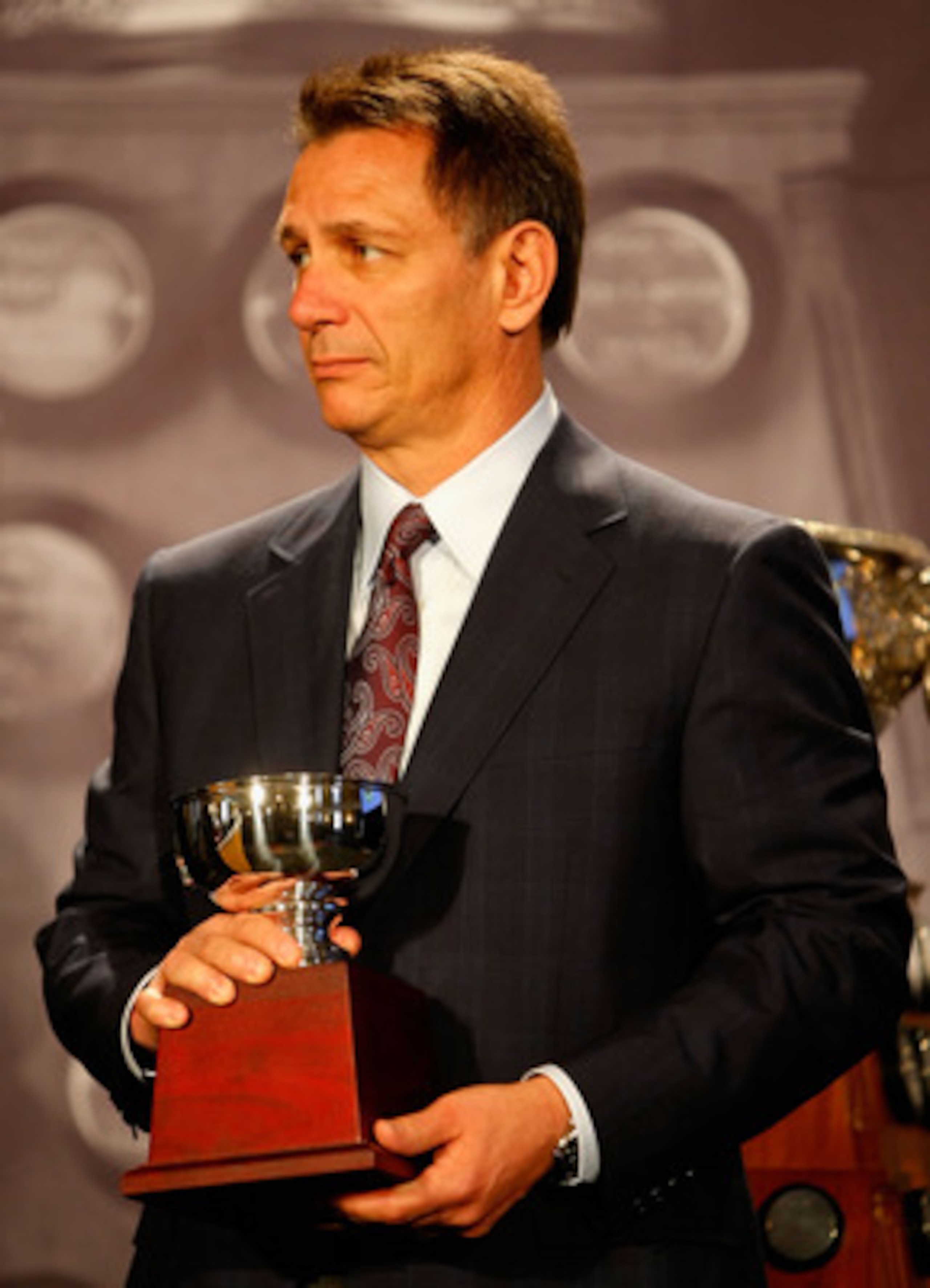 PITTSBURGH - MAY 28: General Manager Ken Holland of the Detroit Red Wings accepts the William M. Jennings Trophy for Chris Osgood (not pictured) during the NHL Awards presentation at the Omni William Penn Hotel on May 28, 2008 in Pittsburgh, Pennsylvania PITTSBURGH - MAY 28: General Manager Ken Holland of the Detroit Red Wings accepts the William M. Jennings Trophy for Chris Osgood (not pictured) during the NHL Awards presentation at the Omni William Penn Hotel on May 28, 2008 in Pittsburgh, Pennsylvania