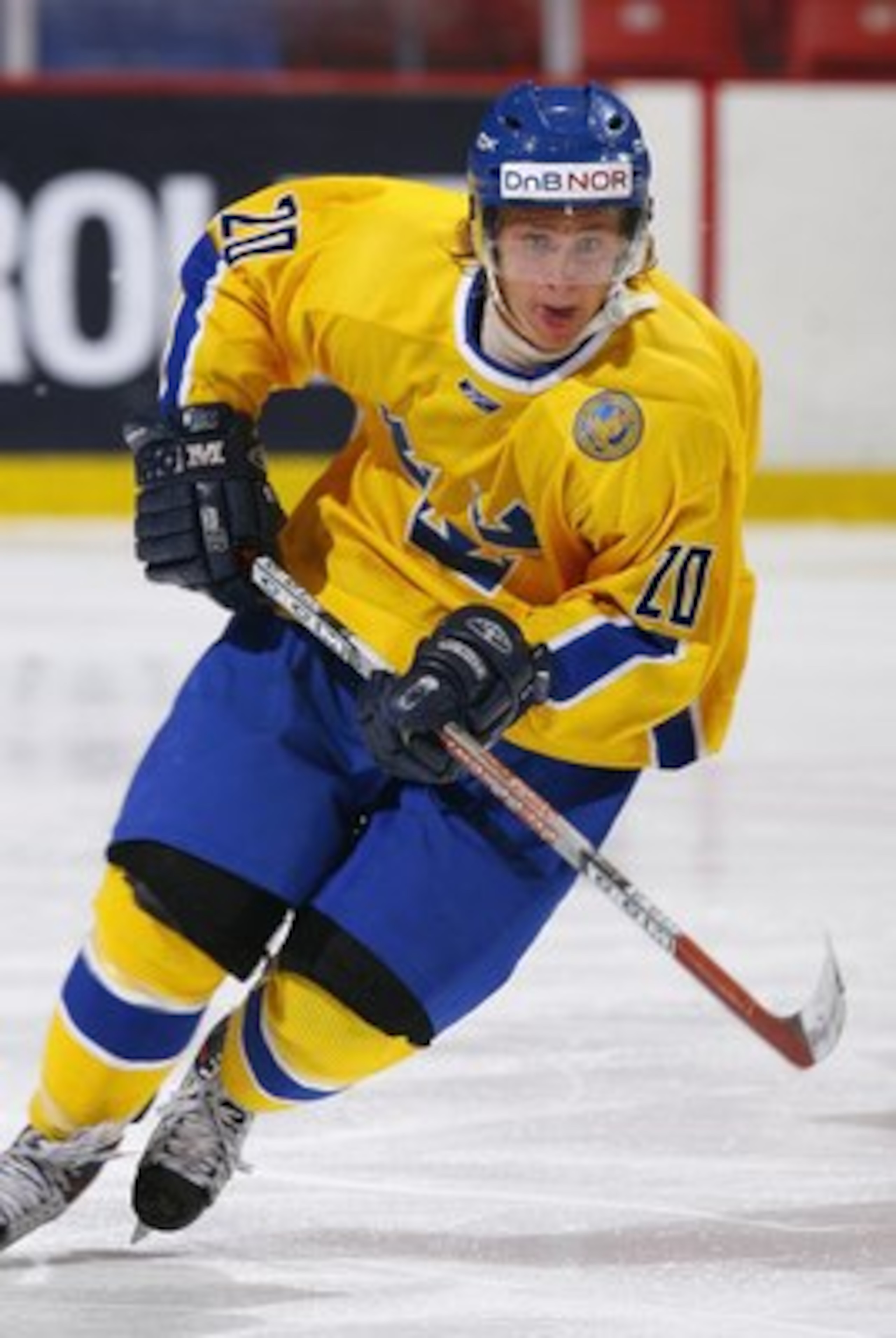 LAKE PLACID, NY - AUGUST 8:  Carl Hagelin #20 of Team Sweden skates against Team USA Blue during an exhibition game on August 8, 2007 at the 1980 Rink Herb Brooks Arena in Lake Placid, New York. Team USA Blue defeated Sweden 5-3. (Photo by Phillip MacCall