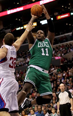 LOS ANGELES, CA - FEBRUARY 26:  Glen Davis #11 of the Boston Celtics shoots over Blake Griffin #32 of the Los Angeles Clippers at Staples Center on February 26, 2011  in Los Angeles, California.  The Celtics won 99-92.   NOTE TO USER: User expressly ackno