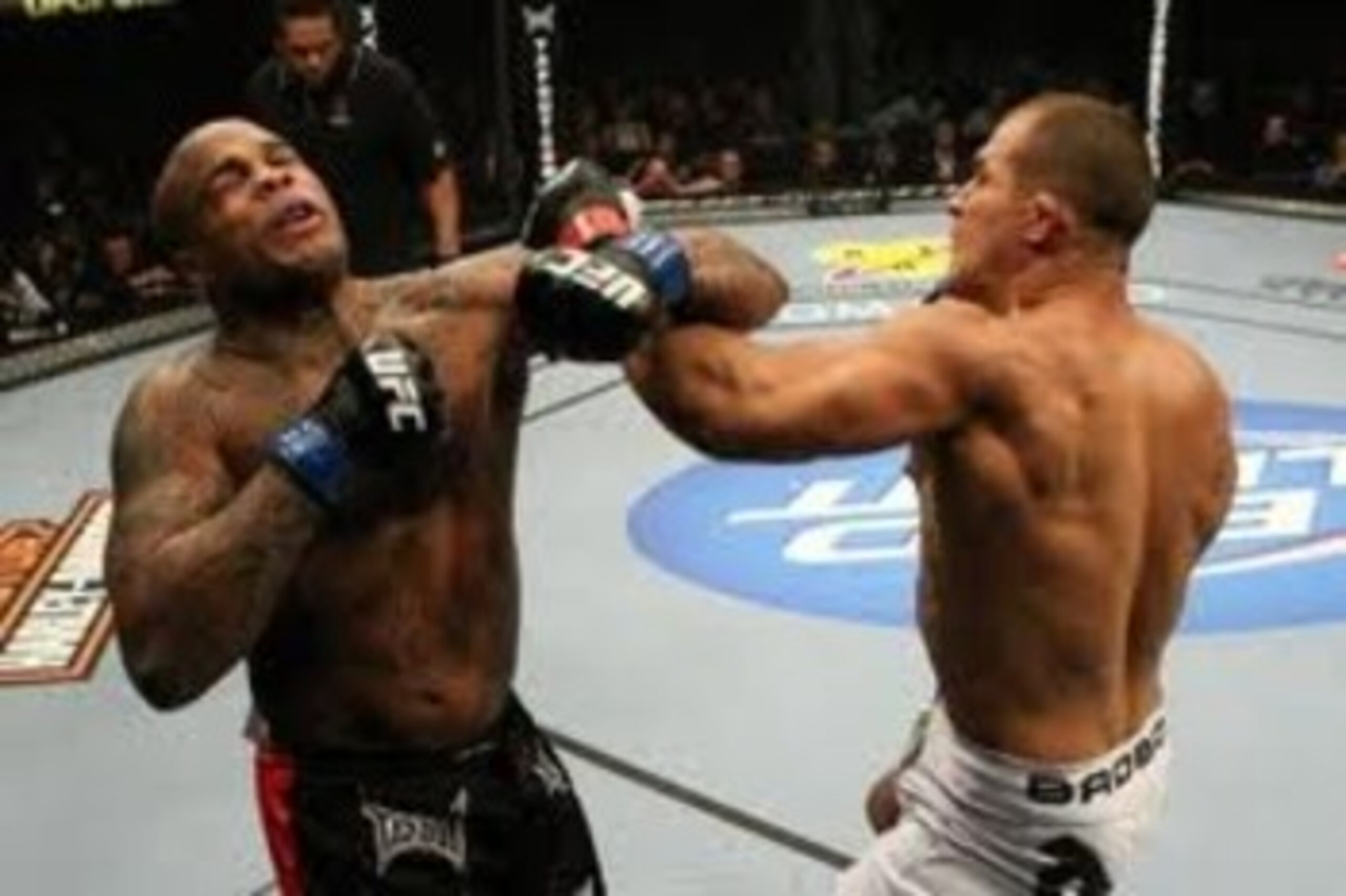 Junior dos Santos delivering a savage left hook on Gilbert Yvel